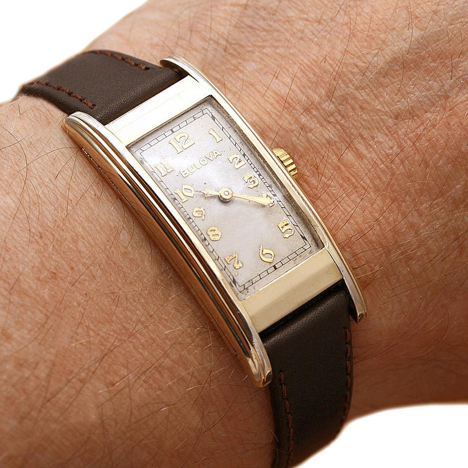 For your consideration is this rather stylish Art Deco 10k gold filled Gents wristwatch by the American watch company Bulova, recently fully serviced and keeping very good time. This is a great looking watch with a beautiful dial with gold tone