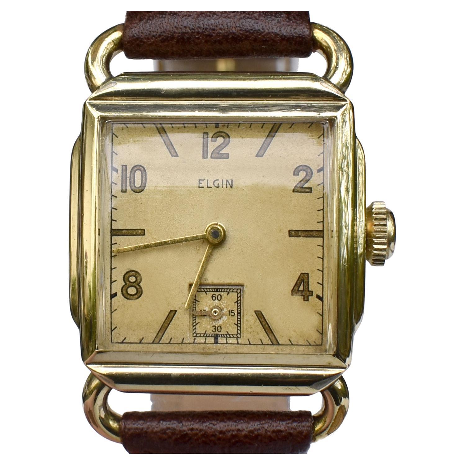 Montre-bracelet d'homme en or 10k d'Elgin, entièrement révisée, c1946