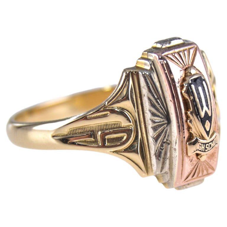 UNISEX RING
STYLE / REFERENCE: Art Deco Signet Ring
METAL / MATERIAL: 10Kt. Solid Gold Multi Colored Rose, Yellow, White
CIRCA / YEAR: 1953
SIZE: 10.25

This classic Art Deco ring is hand constructed for a high school, likely back east in solid 10Kt