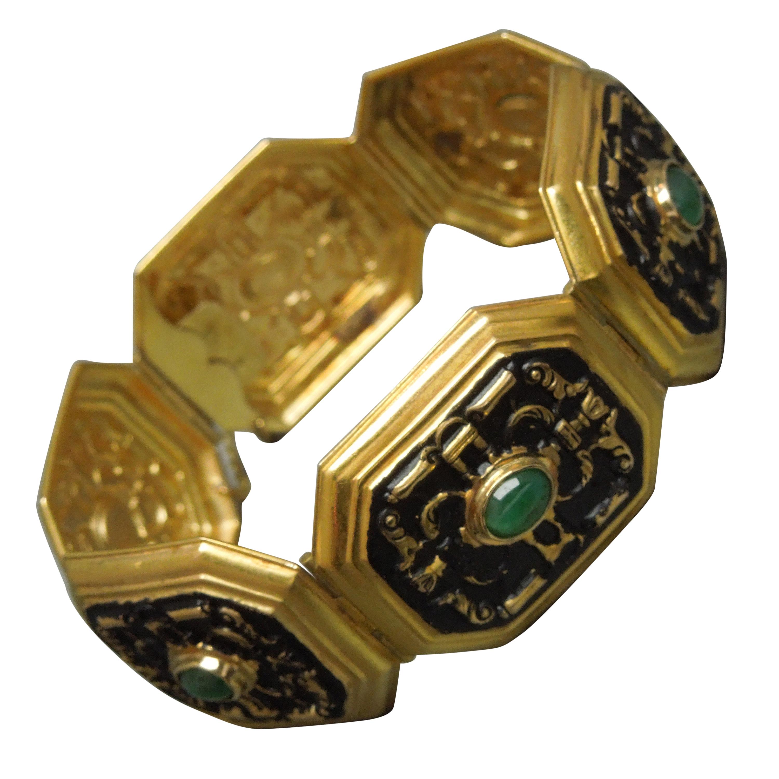 Art Deco 11 Carat Emerald 18 Karat Gold and Black Enamel Bracelet For Sale