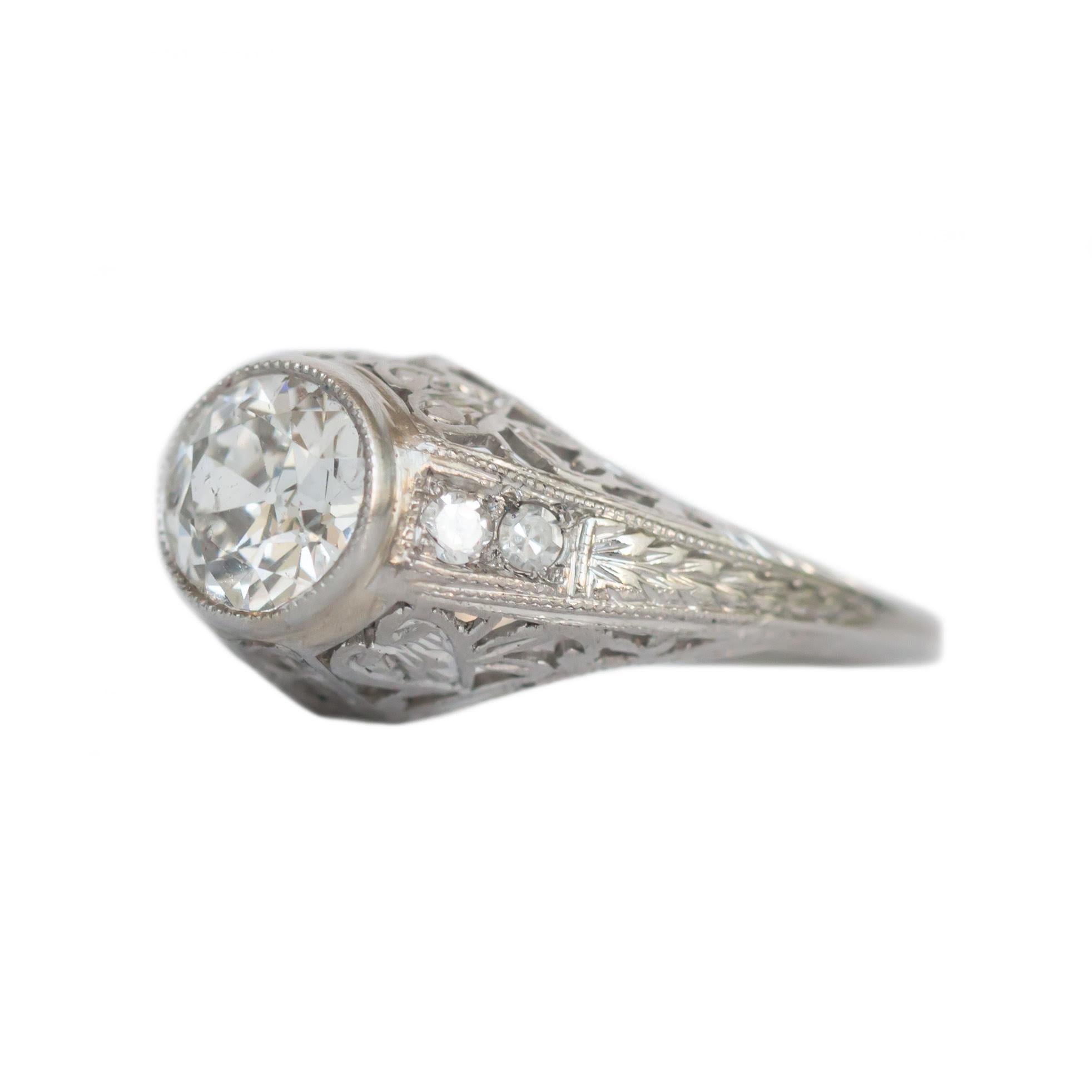 Here we have an beautiful example of an Art Deco era engagement ring! This genuine 1920's ring features a brilliant .94 Carat Old European cut diamond set beautifully in a highly detailed platinum ring. The beautifully crafted platinum ring is