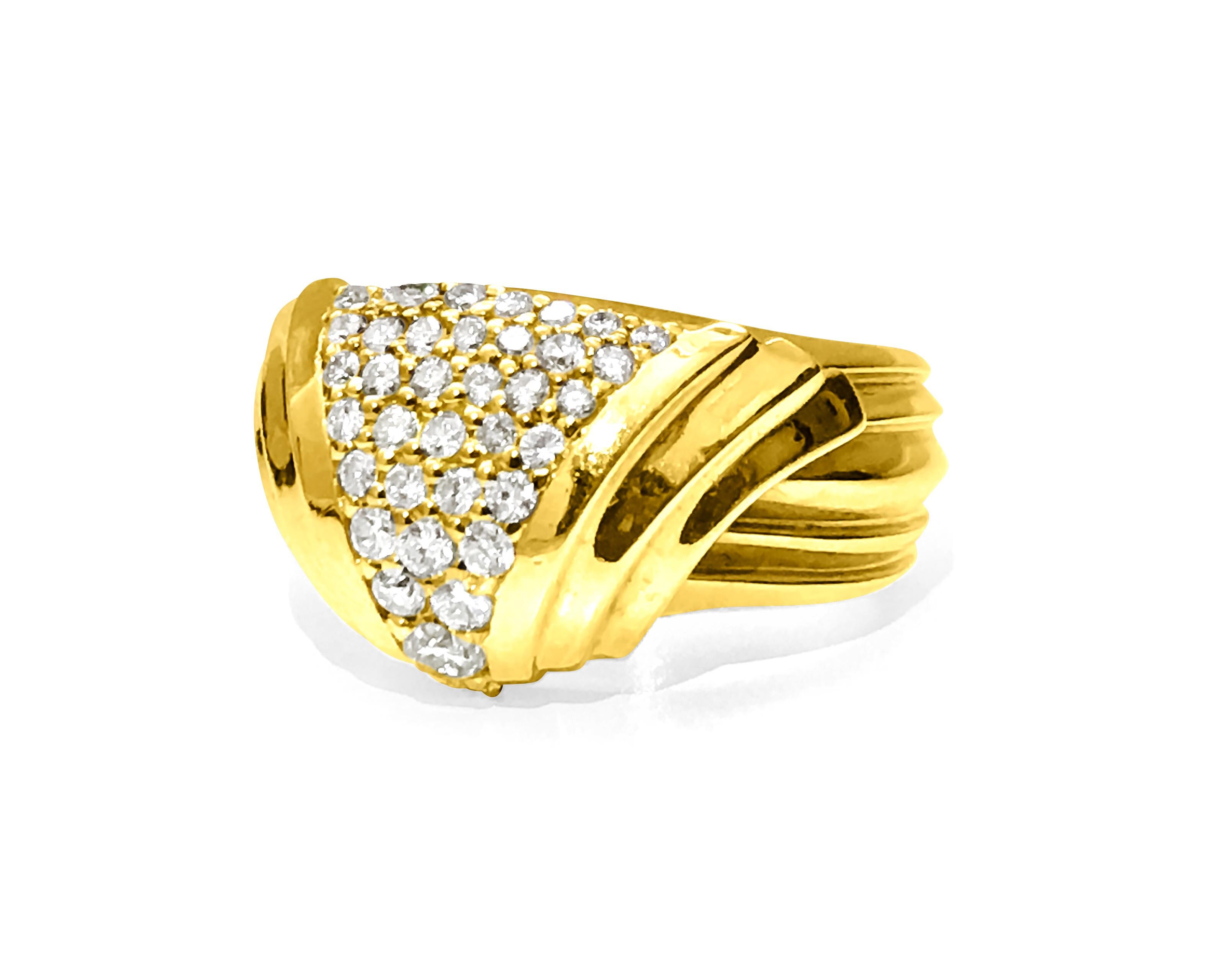 Metal: 18K Yellow Gold.
Total weight: 15.40 Grams. 
TCW of diamonds: 1.10 cts.
VVS clarity and F-G color. All stones set in shared prong setting. 

Custom made unisex yellow gold and diamond ring. Art deco Style and vintage style diamond ring.