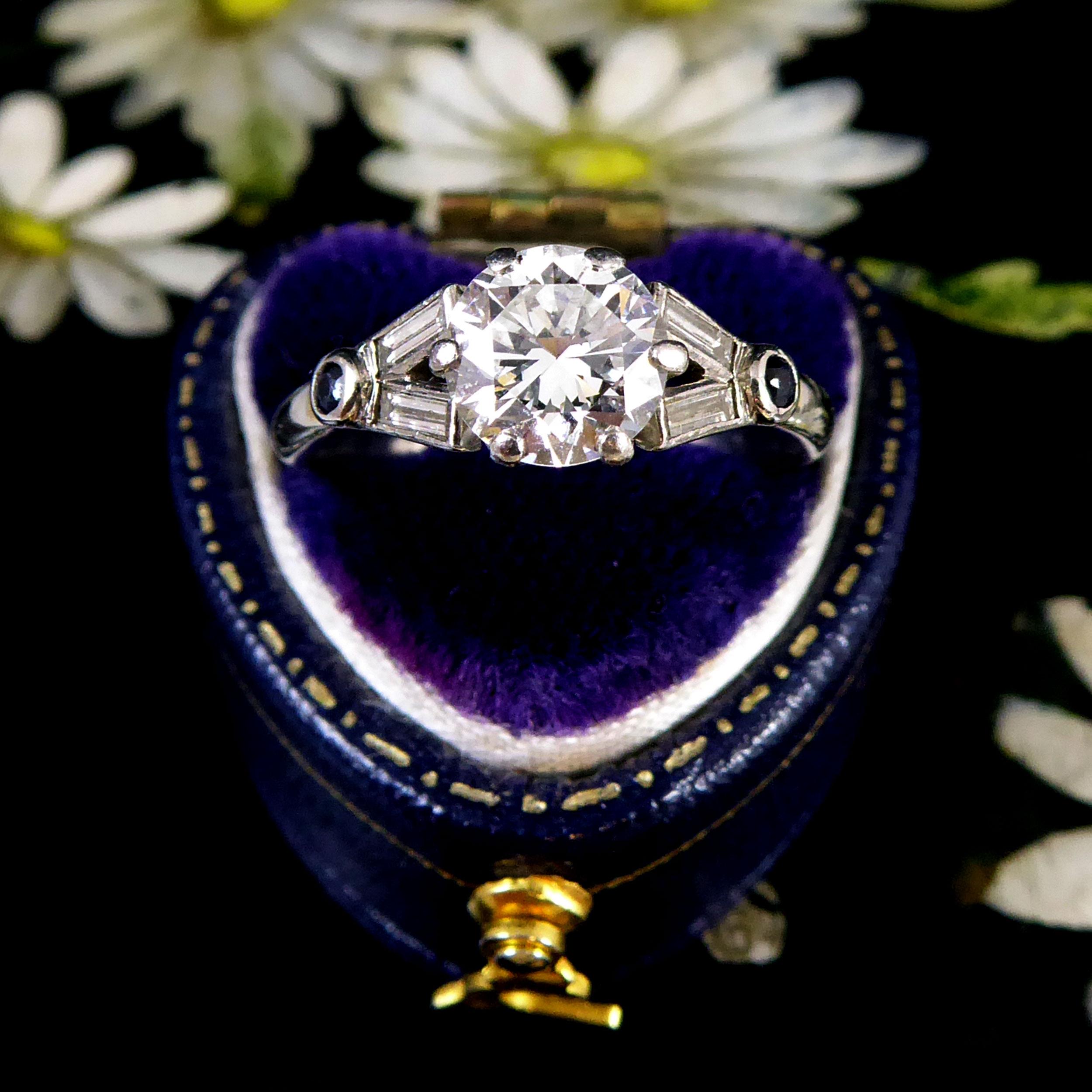 Round Cut Art Deco 1.10 Carat Diamond Ring with Baguetee Diamond and Sapphire Shoulders