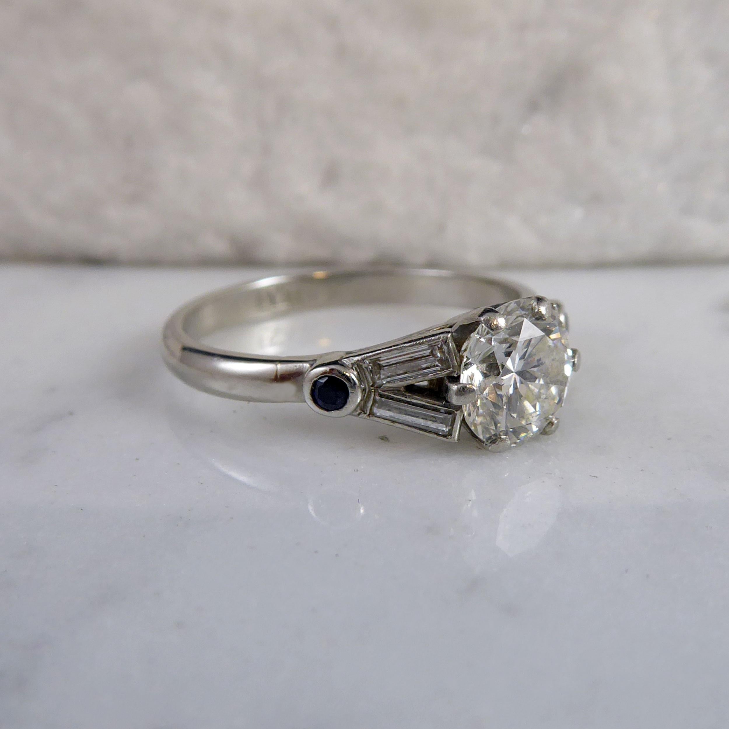 Women's Art Deco 1.10 Carat Diamond Ring with Baguetee Diamond and Sapphire Shoulders