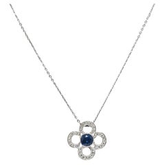 Art Deco 1.10 Carats Diamond Sapphire Platinum Quatrefoil Pendant Necklace Art Deco 1.10 Carats Diamond Sapphire Platinum Quatrefoil Pendant Necklace