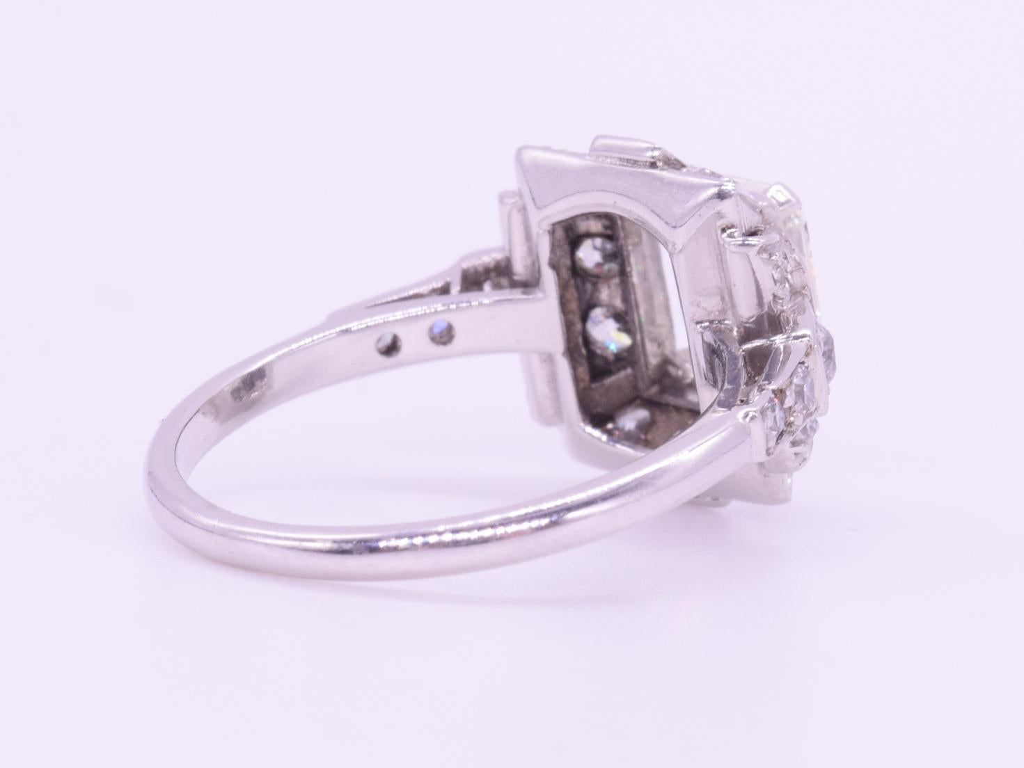 1920 emerald cut diamond ring