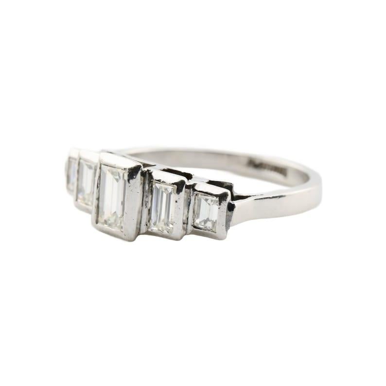 Art Deco 1.10CTW Stepped Baguette Cut Diamond Band Ring in Platinum Circa 1920's In Good Condition For Sale In Boston, MA