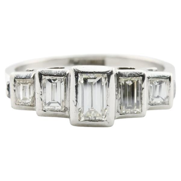 Art Deco 1.10CTW Stepped Baguette Cut Diamond Band Ring in Platinum Circa 1920's For Sale
