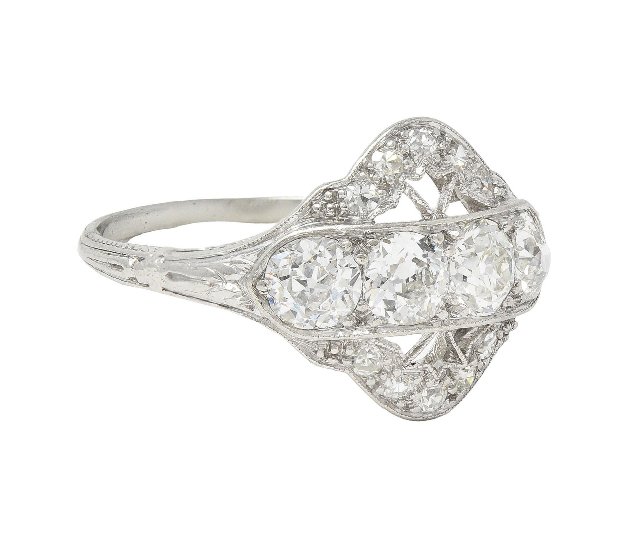 Designed as a pierced navette form centering a row of old European cut diamonds 
Weighing approximately 1.00 carat total - H to J color with VS2 to SI1 clarity
Bead set east to west with additional single cut diamonds along edge
Bead set and