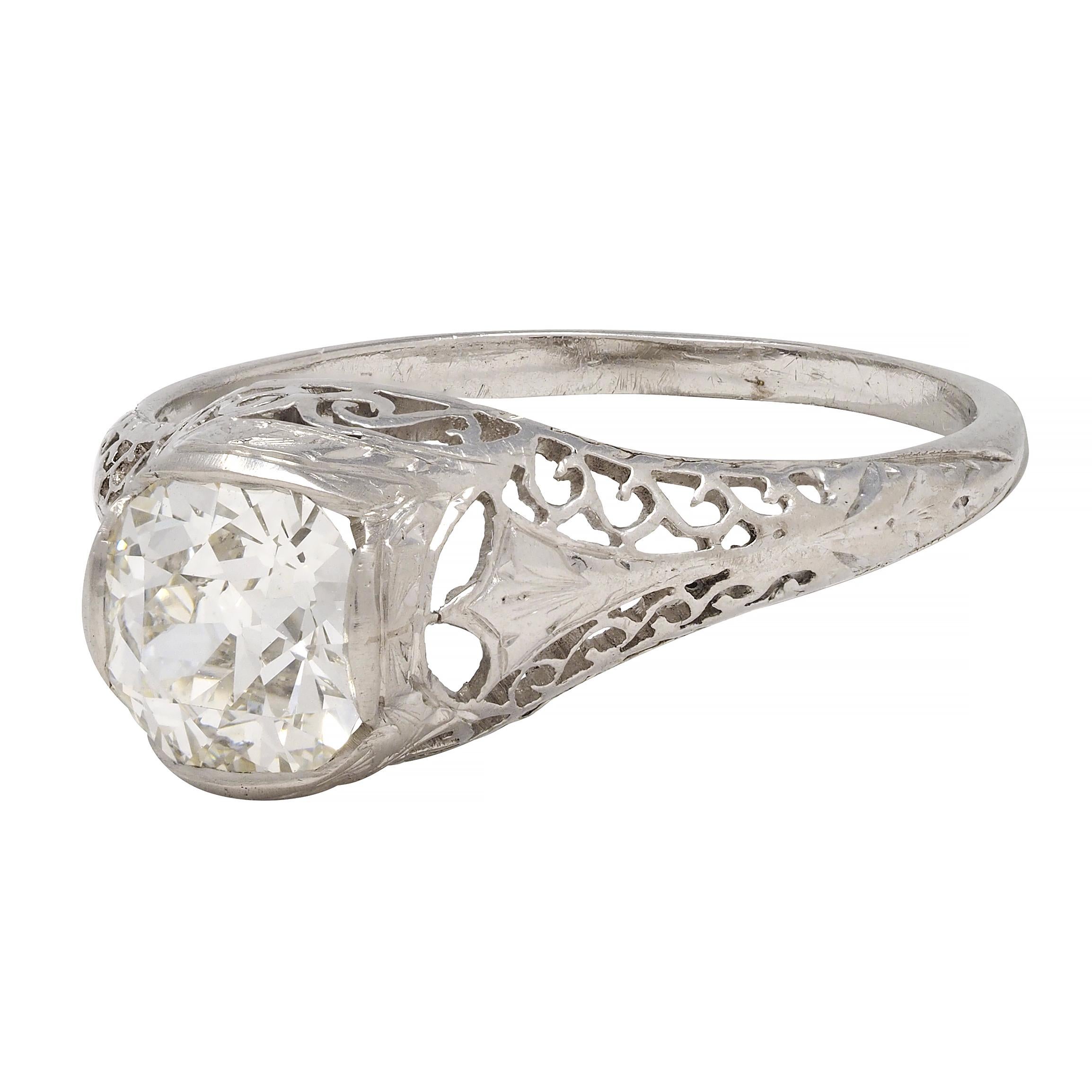 Women's or Men's Art Deco 1.17 CTW Diamond Platinum Arching Scroll Antique Engagement Ring For Sale