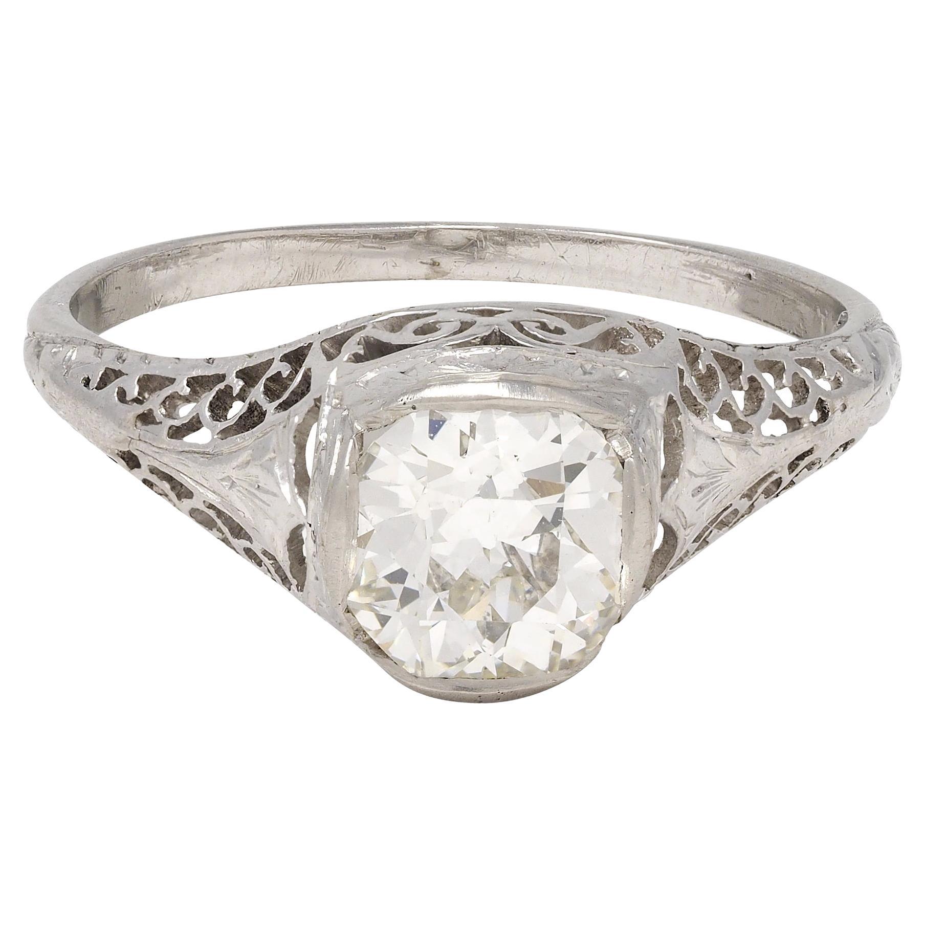 Art Deco 1.17 CTW Diamond Platinum Arching Scroll Antique Engagement Ring For Sale