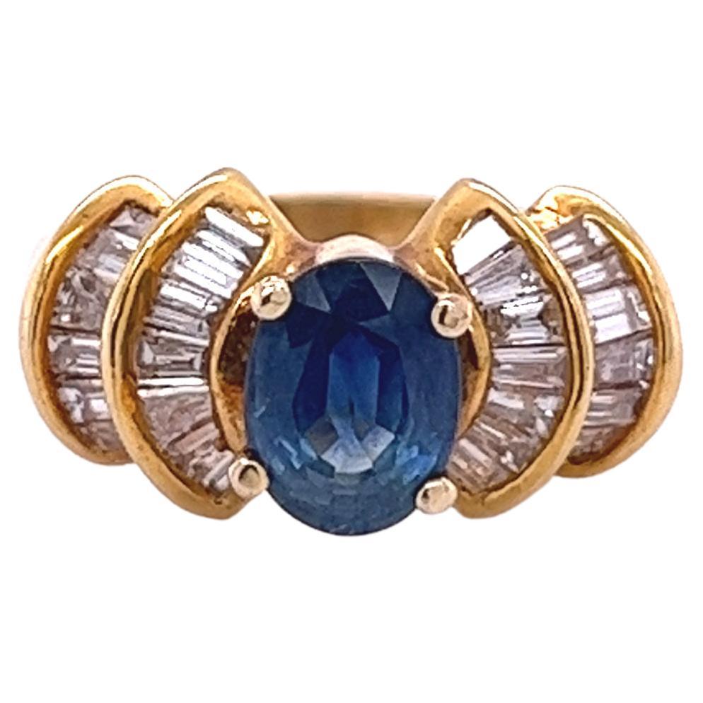 Art Deco 1.19 Carat Oval Blue Sapphire with Baguette Cut Diamonds in 14k Ring For Sale