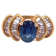 Art Deco 1,19 Karat ovaler blauer Saphir mit Diamanten im Baguetteschliff in 14k Ring