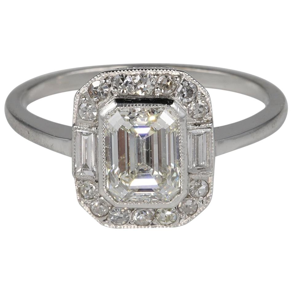 Art Deco 1.20 Carat Emerald Cut Diamond Solitaire Plus Platinum Ring For Sale