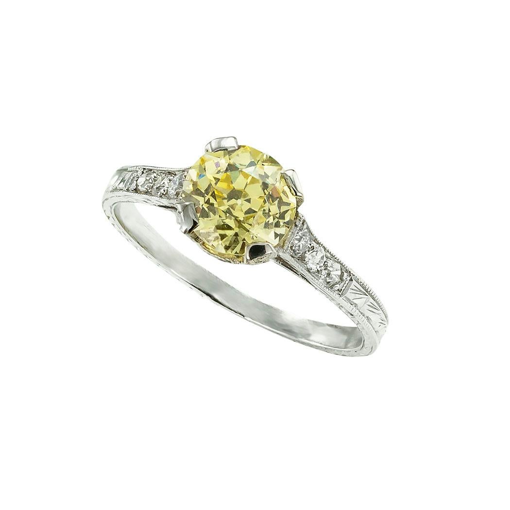 GIA report certified fancy yellow 1.20-carat old European-cut diamond and platinum Art Deco solitaire engagement ring circa 1925. *

ABOUT THIS ITEM:  #A8099. Scroll down for specifications.  The GIA fancy yellow color and VVS2 clarity gradings are