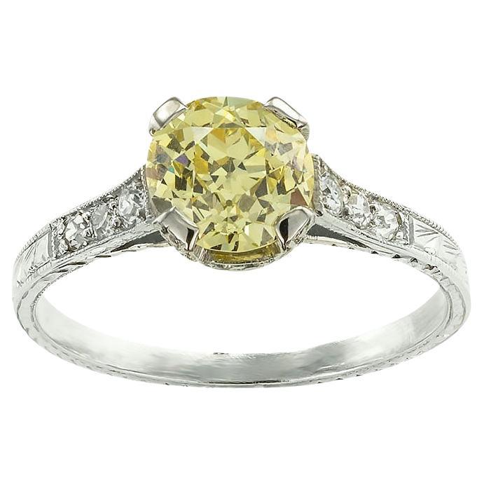 Art Deco 1.20 Carat Fancy Yellow Diamond Platinum Engagement Ring For Sale