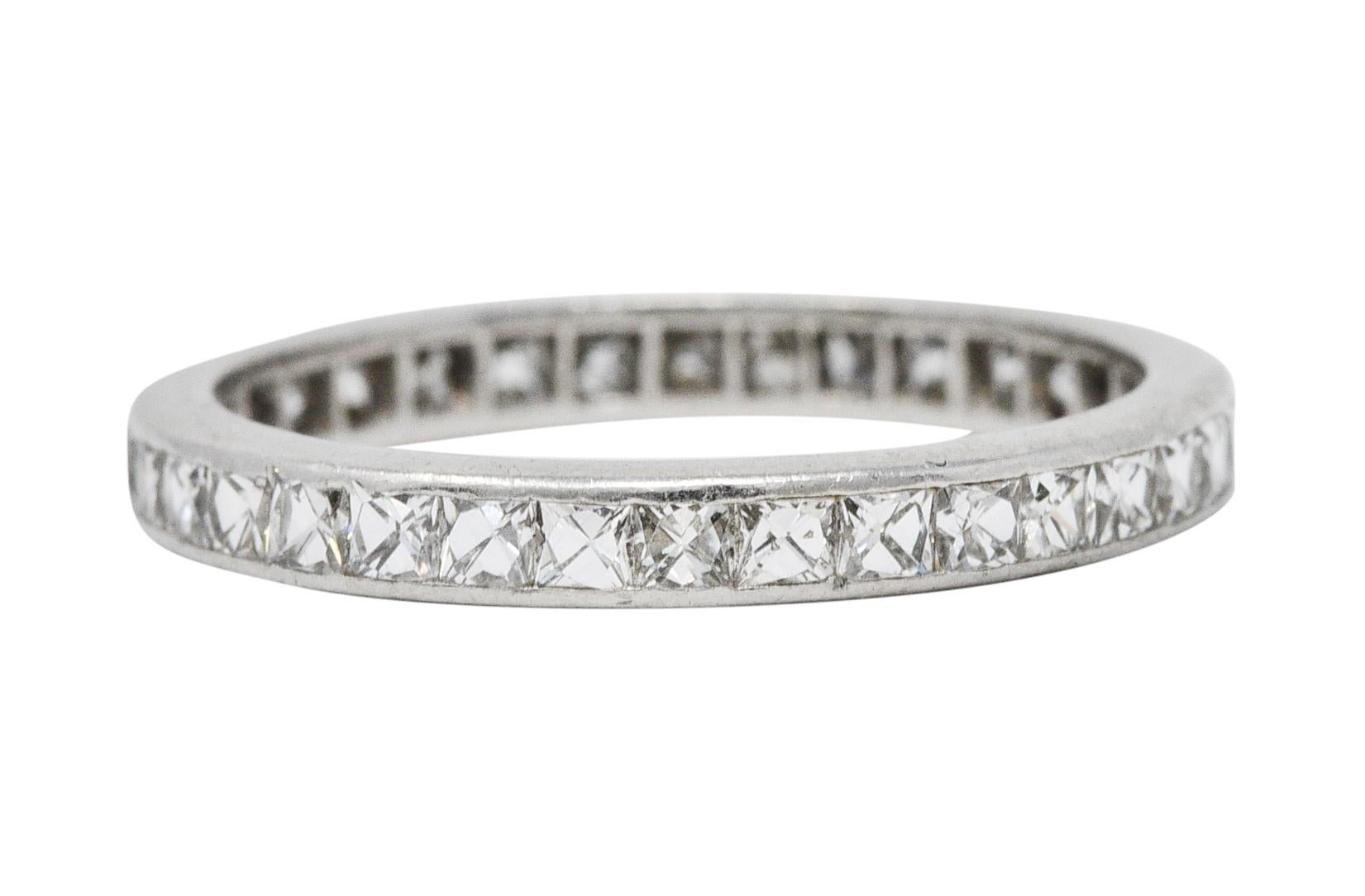 Eternity style band is channel set fully around by French cut diamonds

Weighing in total approximately 1.20 carats with G to I color and VS clarity

Tested as platinum

Circa: 1930s

Ring Size: 5 1/4 & not sizable

Measures North to South 2.3 mm