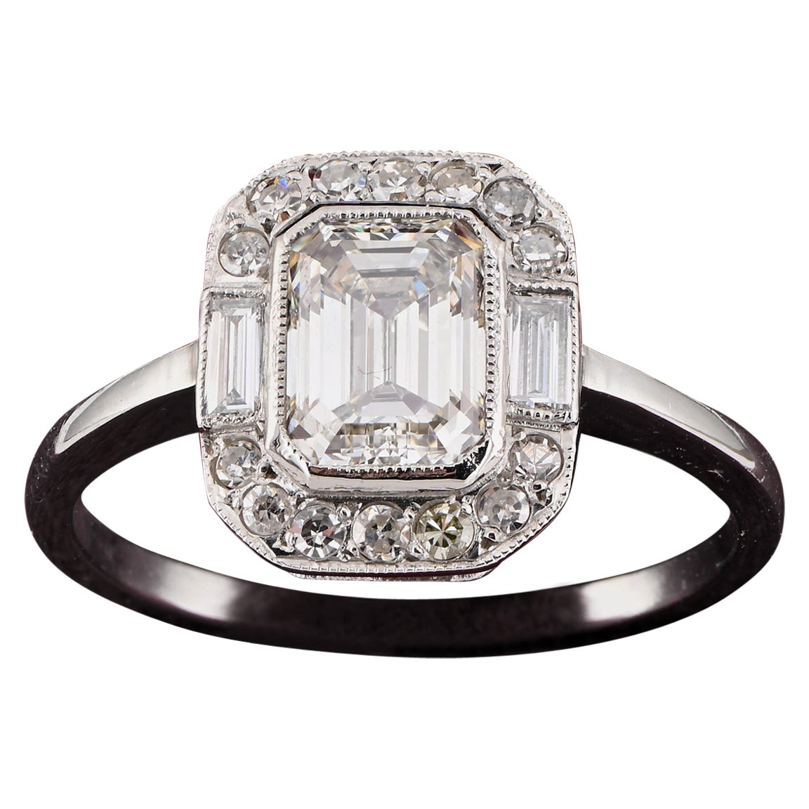 Bague solitaire Art déco en platine avec diamant taille émeraude 1,20 carat