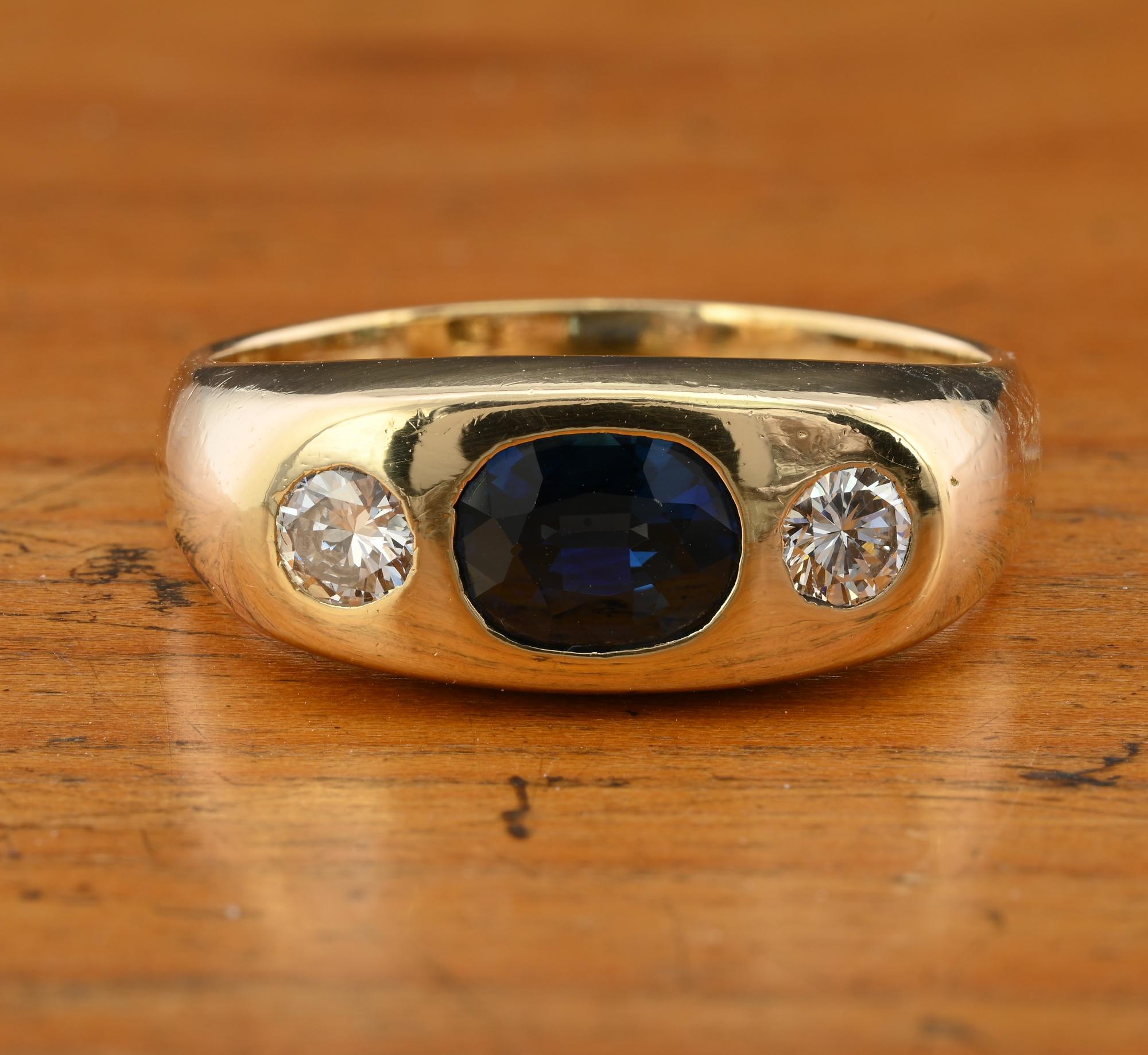 This fabulous Diamond Sapphire three stone Gent ring is 1930 circa
Beautiful designed hand crafted of solid 18 KT gold, Italian marks from the period
Facing up with a classy combination of three stone comprising a natural Sapphire of 1.20 Ct (7.2 x