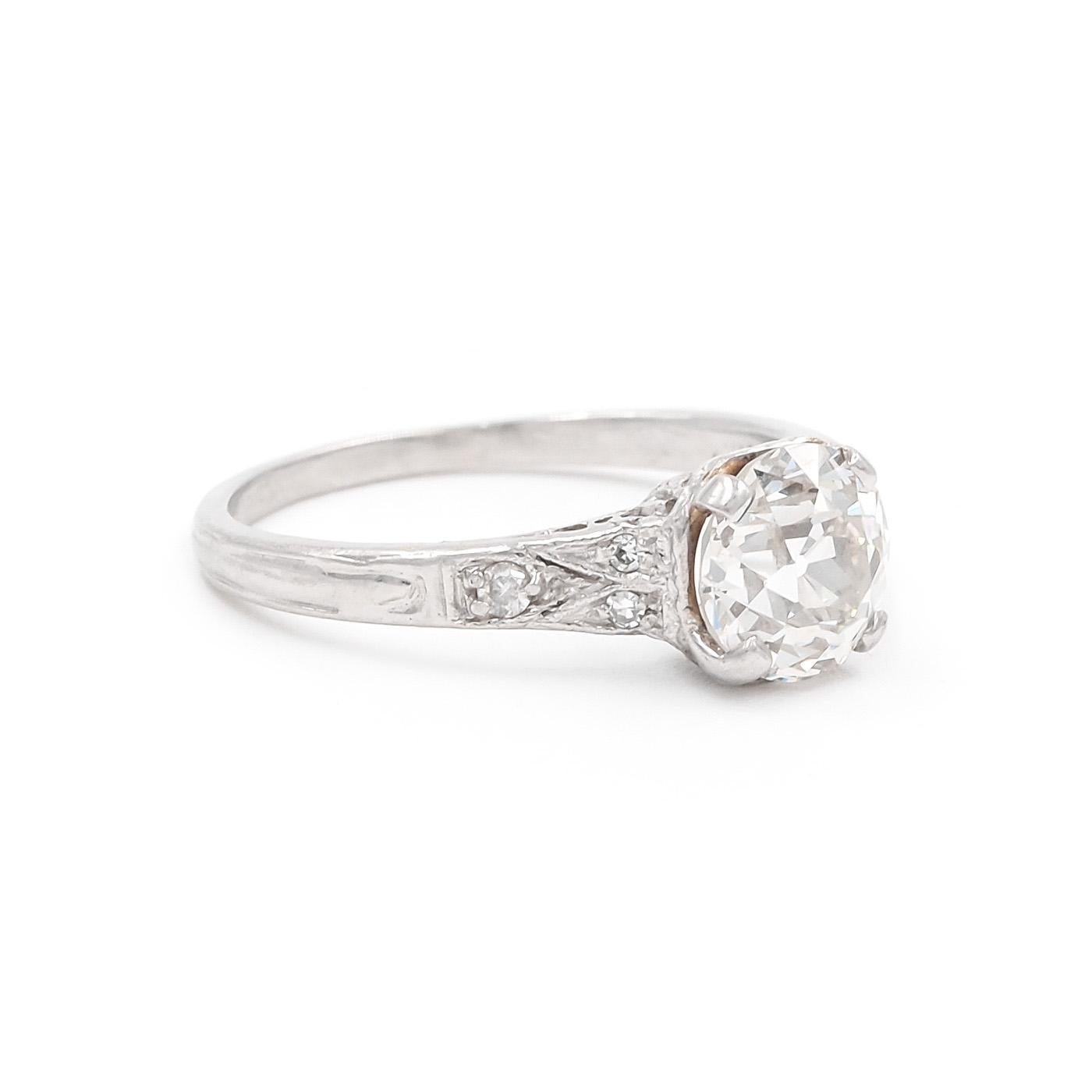 Early Art Deco era 1.21 Carat Old European Cut Diamond Engagement Ring composed of platinum. The 1.21 carat Old European Cut diamond is GIA certified J color & SI1 clarity. Set with an additional 6 Single Cut diamonds weighing approximately 0.05