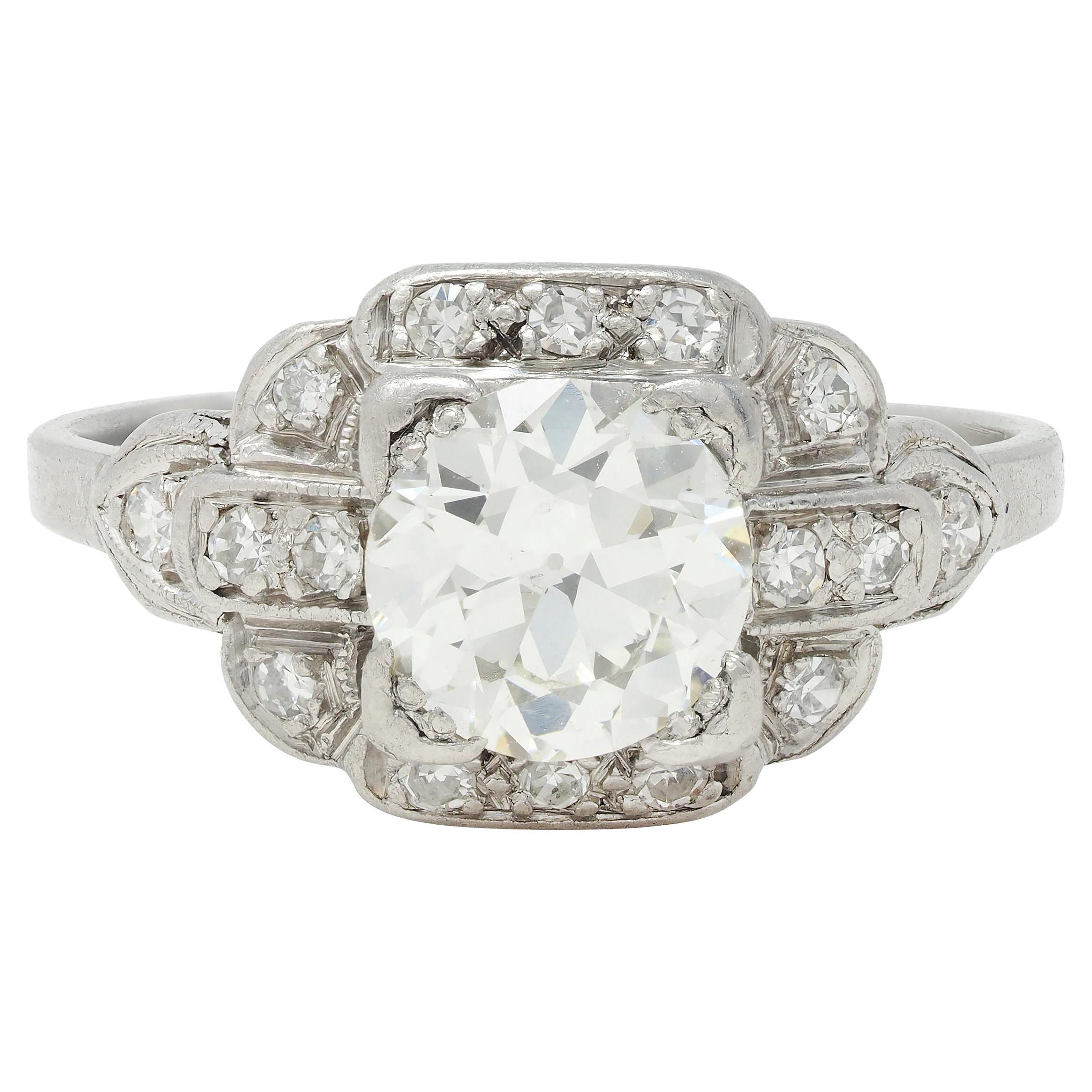 Art Deco 1.21 CTW Diamond Platinum Stepped Buckle Vintage Engagement Ring For Sale