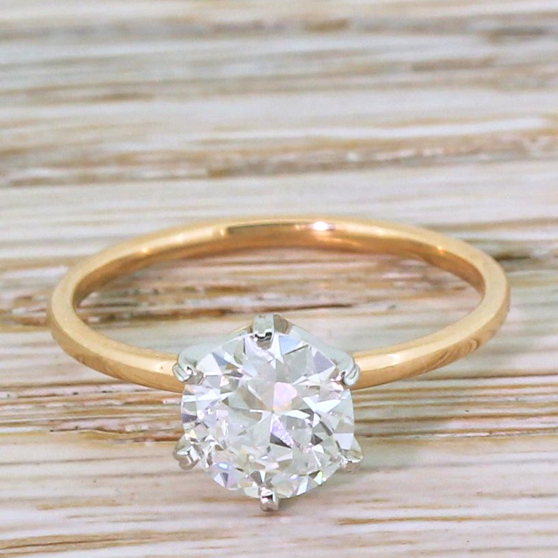 This most glorious of vintage engagement rings features an old European cut diamond of the highest quality. Graded by HRD as F colour, VVS1 clarity, this neigh on perfect diamond absolutely glows with live and fire. The stone is secured in a six