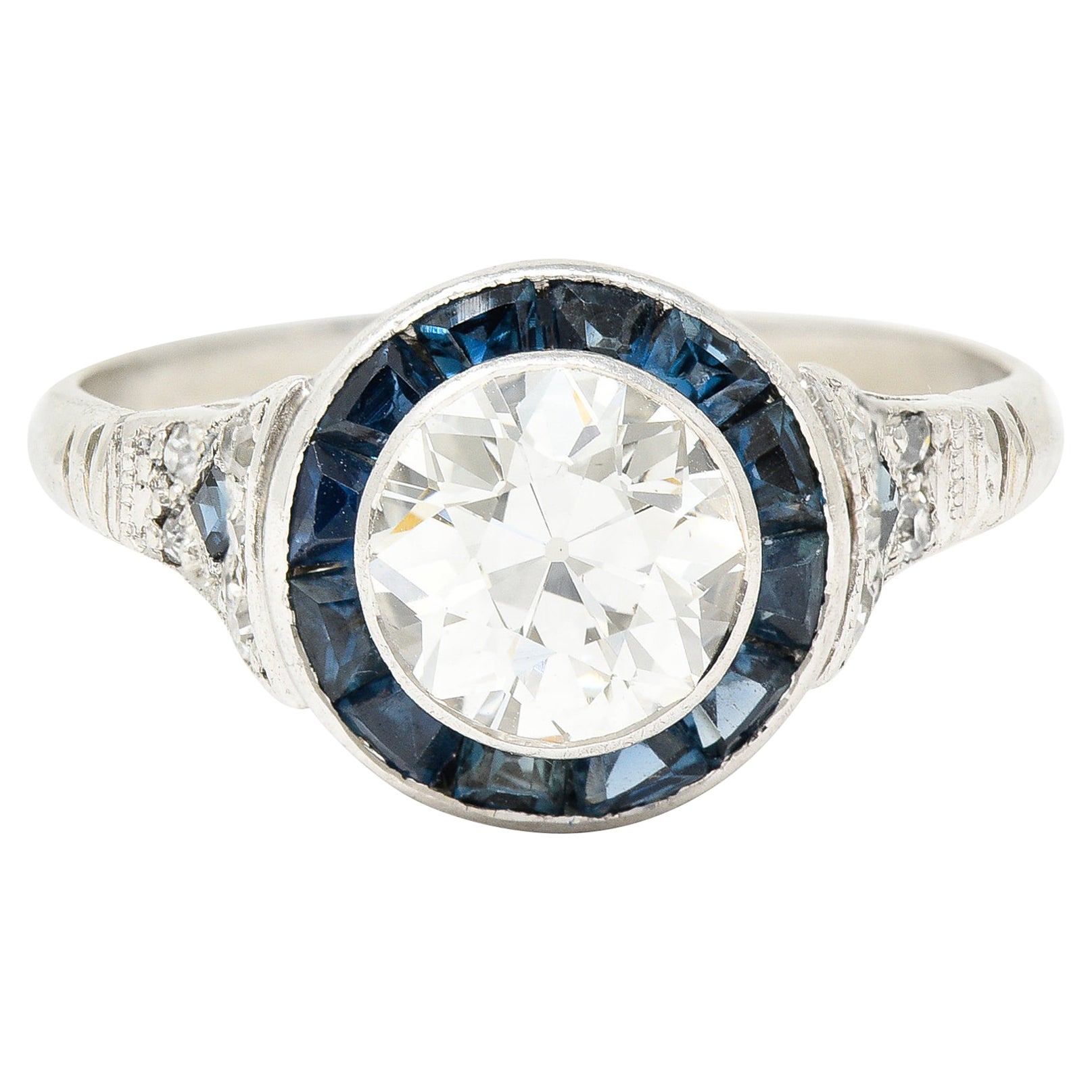 Anillo de compromiso Art Decó con halo de zafiro y diamantes talla europea antigua de 1,22 quilates