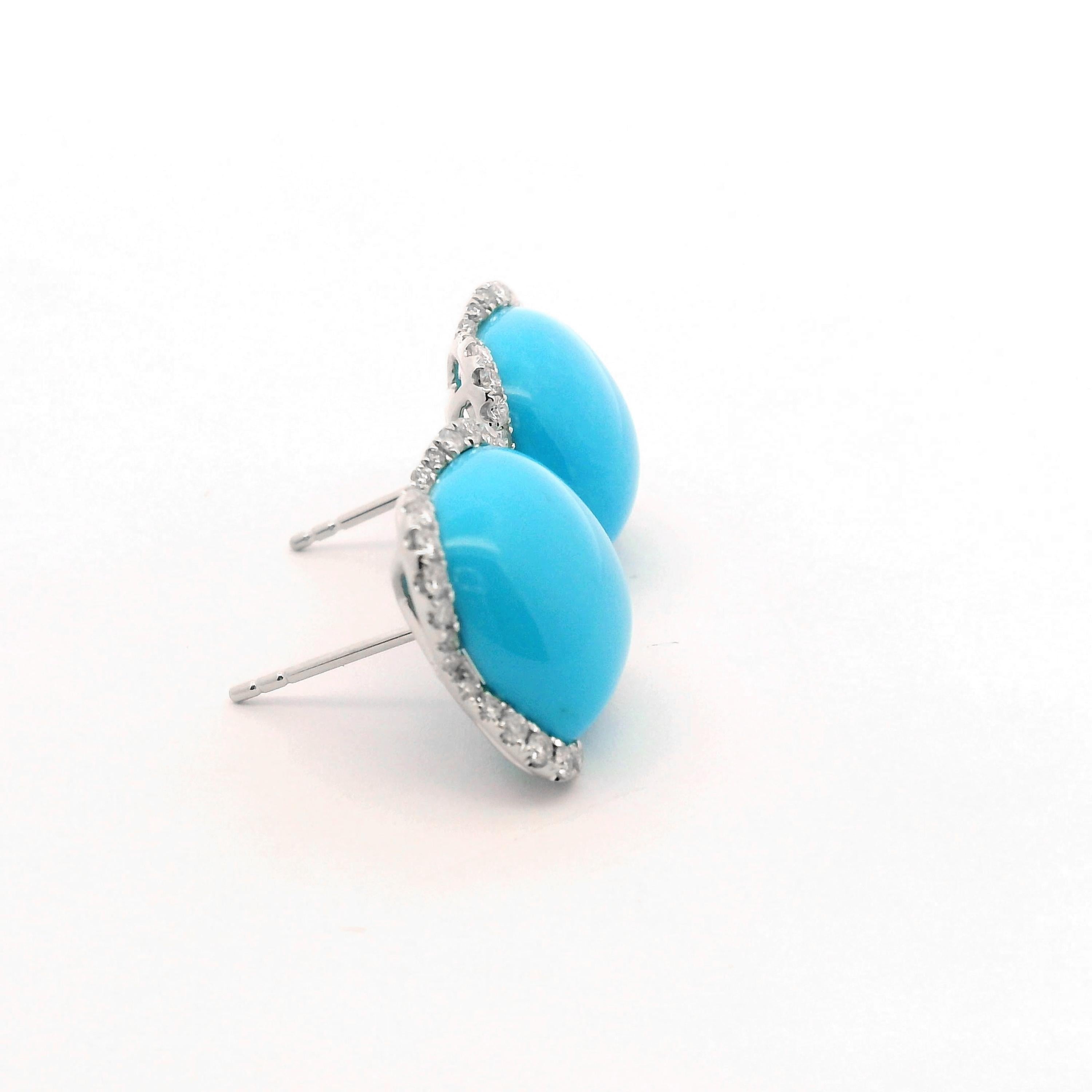 Add a touch of elegance and vibrancy to your look with these exquisite 18K white gold stud earrings.   Featuring 12.55 carats of polished turquoise gemstones, their stunning robin's egg blue hue brings a fresh and bold charm to the design.  