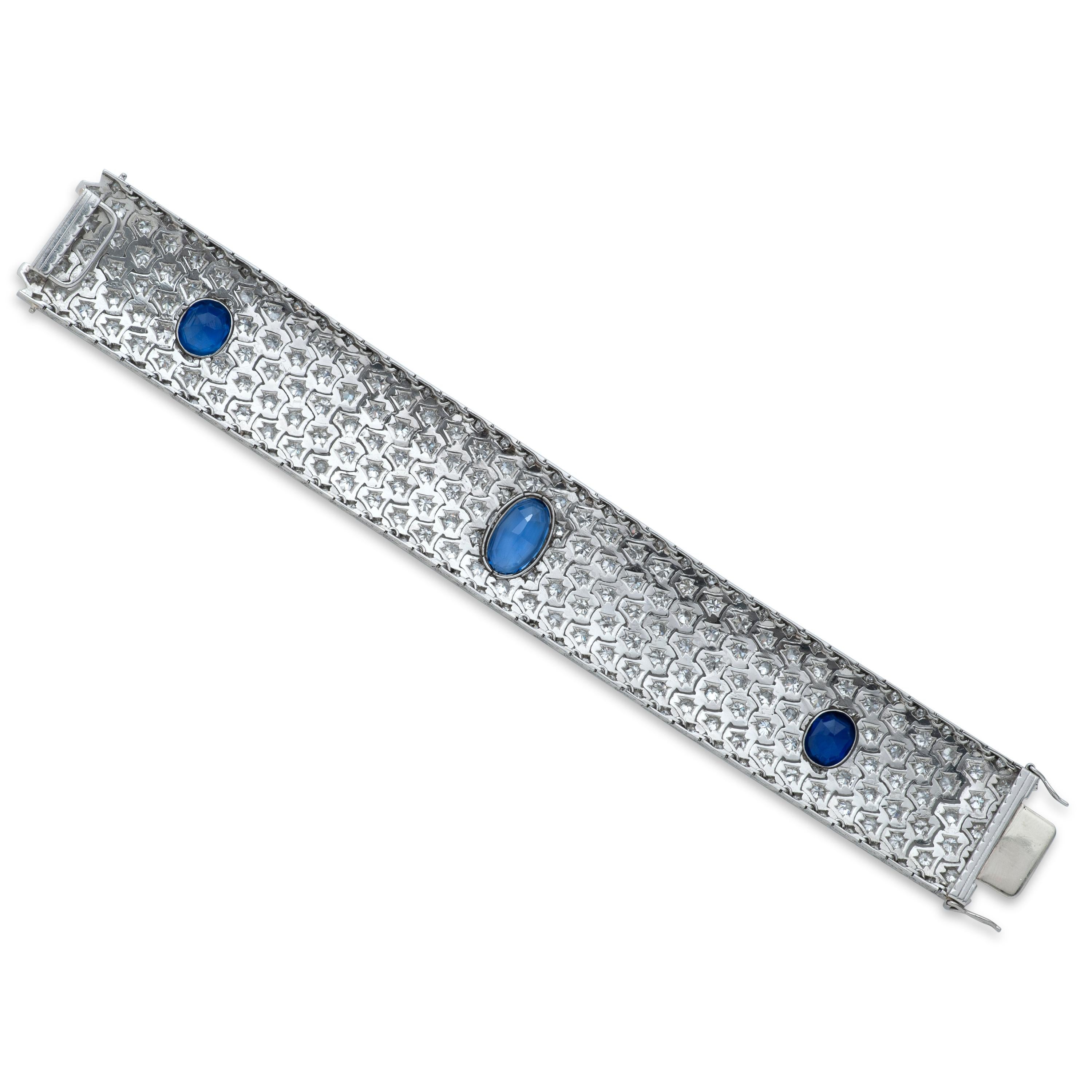 Art Deco platinum sapphire and diamond bracelet with French hallmarks.  
This bracelet contains 3 unheated Burma sapphires totaling approximately 12.75 carats, accompanied by an AGL report.
Approximately 16.50ct of diamonds surround the bezel set