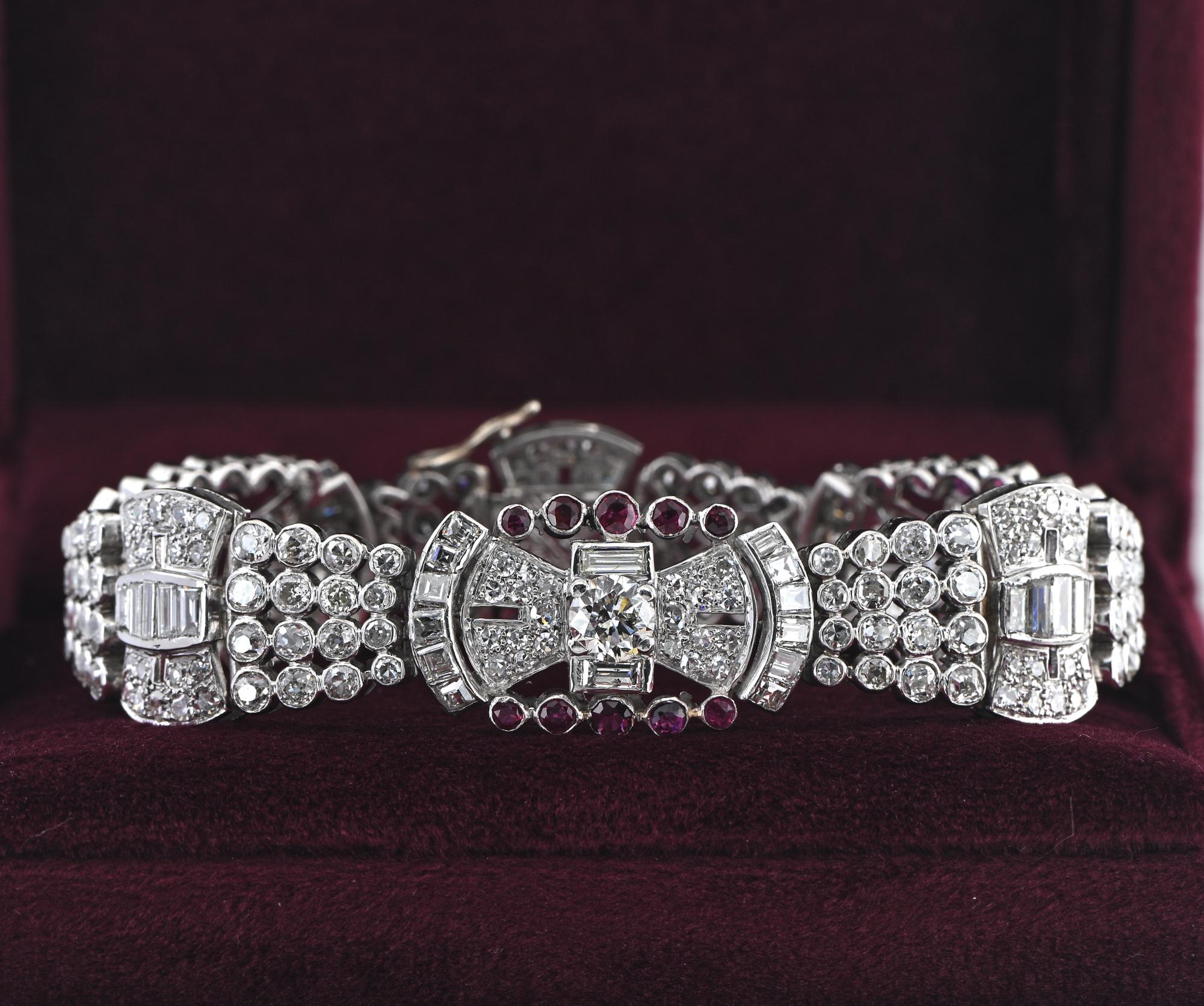 Roaring Jazz Era
This striking late Art Deco Diamond and Ruby wide bracelet express in full the glam and opulence of the era, 1930 ca
Breathtaking design composed by the various Diamonds cut creating a geometric elegant and timeless pattern to