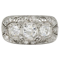 deco pa stone Art Deco 1.32 CTW Diamond Platinum Filigree Vintage Three Stone Ring
