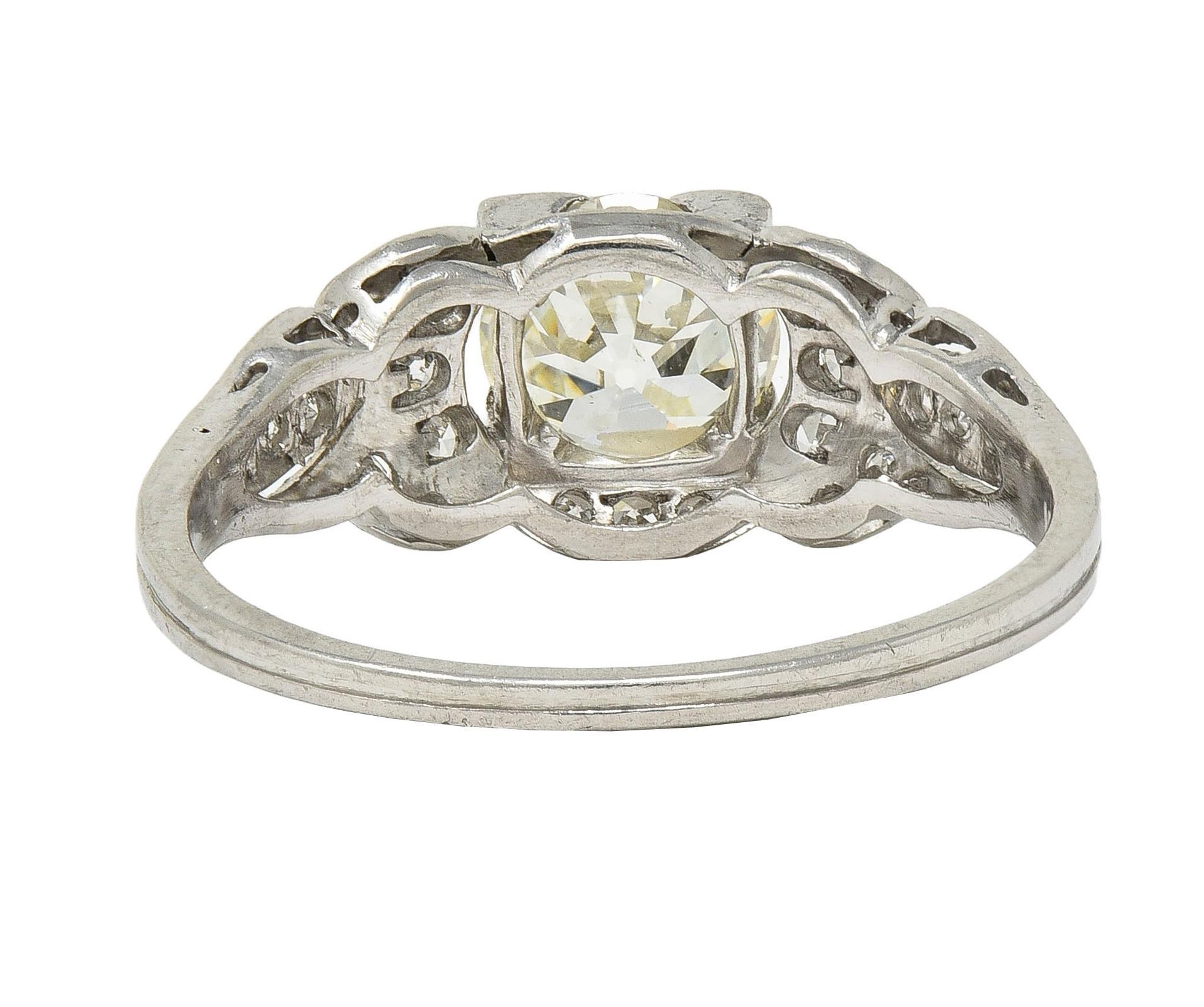 Art Deco 1.35 CTW Old European Diamond Platinum Vintage Bow Engagement Ring In Excellent Condition For Sale In Philadelphia, PA