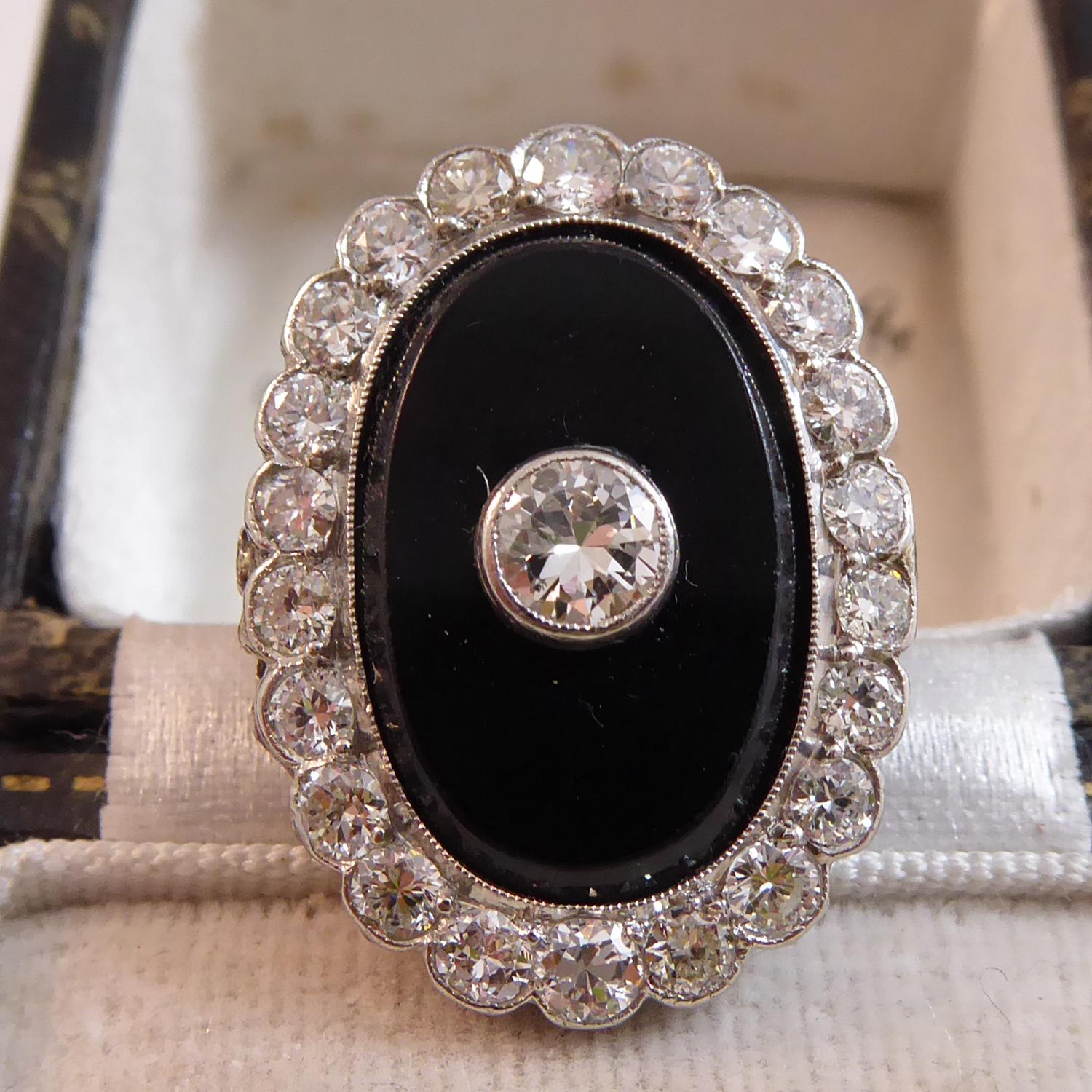 Art Deco 1.37 Carat Diamond and Onyx Ring, Oval Cluster, 1920, Platinum In Good Condition In Yorkshire, West Yorkshire
