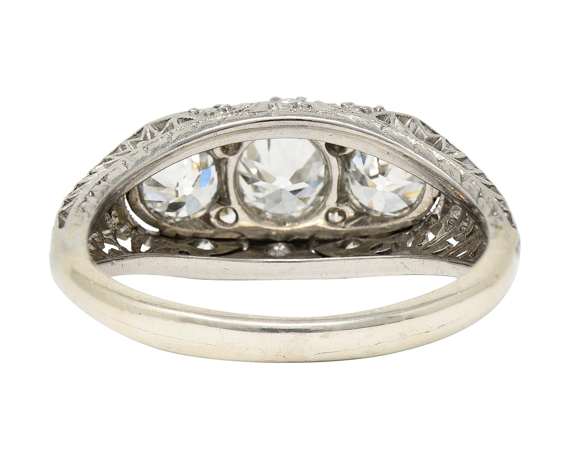 Art Deco 1.38 CTW Diamond Platinum Three Stone Foliate Vintage Ring In Excellent Condition For Sale In Philadelphia, PA