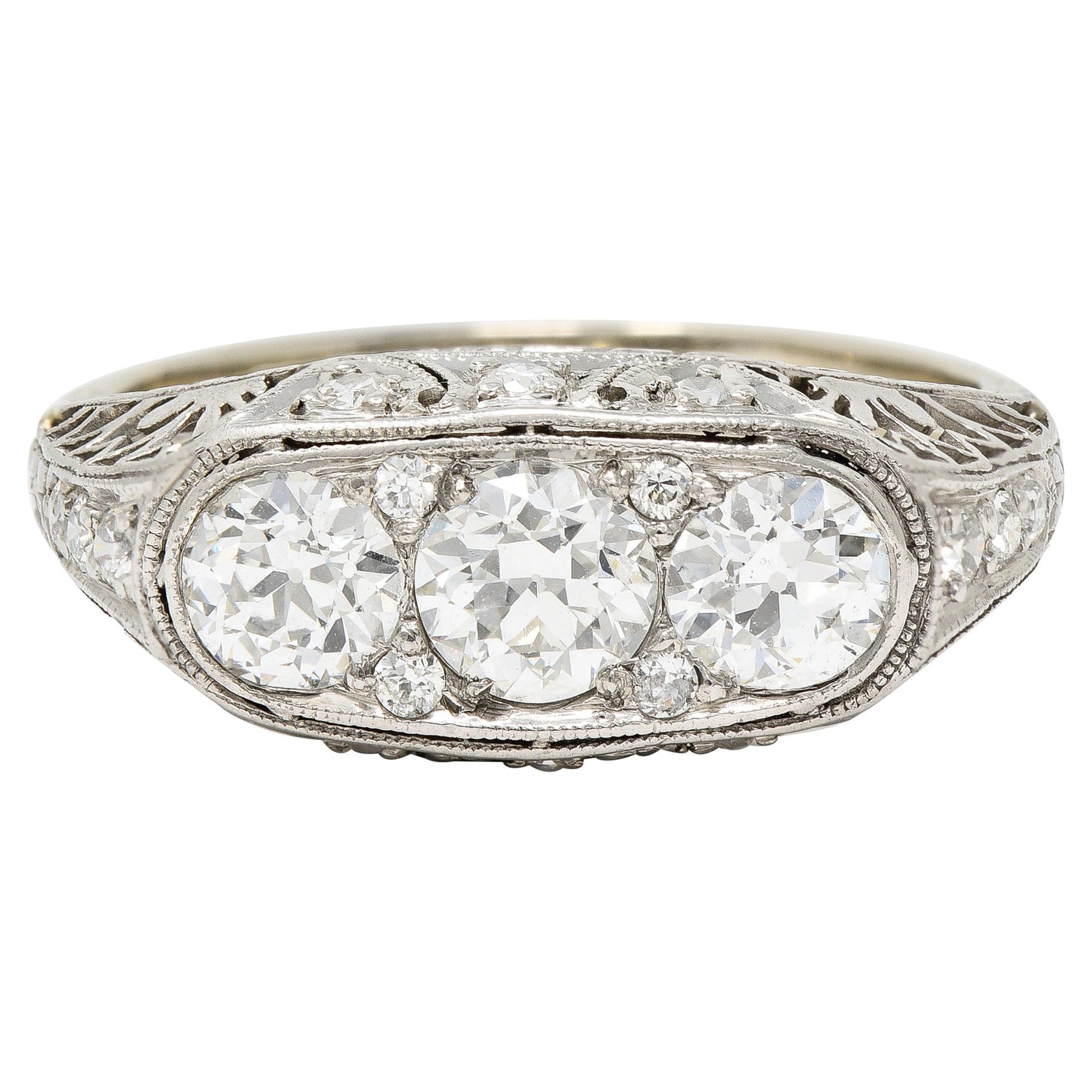 Art Deco 1.38 CTW Diamond Platinum Three Stone Foliate Vintage Ring For Sale