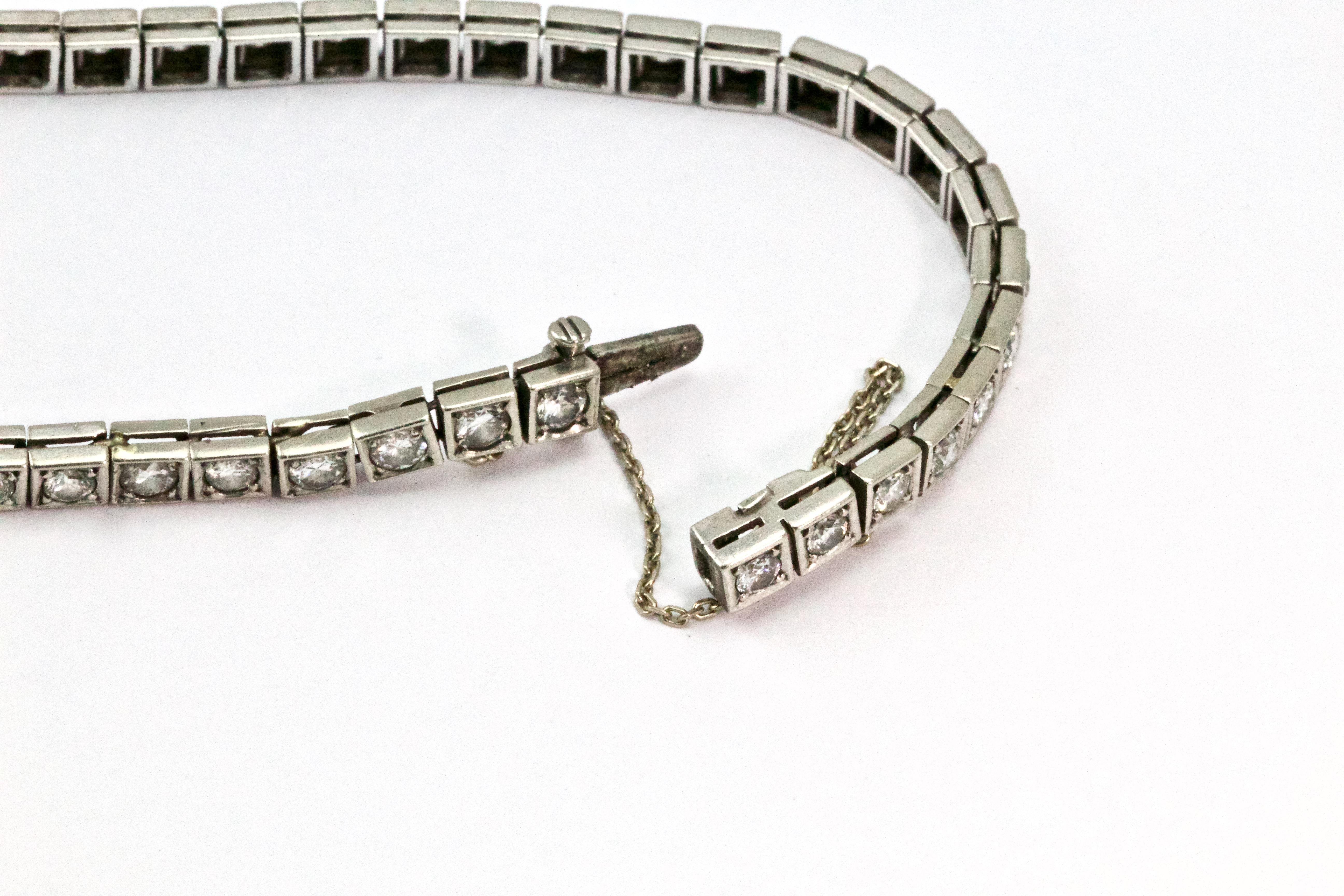 This premium tennis bracelet features 41 Old European cut diamonds set in 14 karat white gold. The diamonds are all graded H-I color and SI1-2 clarity and all together the diamonds weigh approximately 3 carat total weight. The bracelet measures 6.5