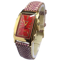 Montre-bracelet Art déco en or 14 carats rouge cerise pour homme par Elgin, nouvellement révisée