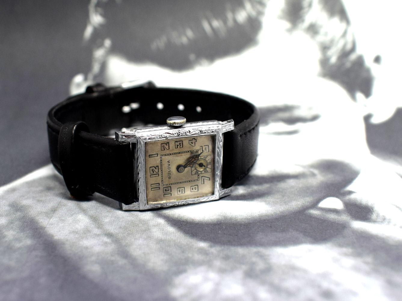 On offer is a fine quality very stylish Art Deco 1930's mens wristwatch by BULOVA . This watch has been fully and professionally serviced.
The case is finished in 14-karat gold fill as confirmed on the inside of the hinged case back together with