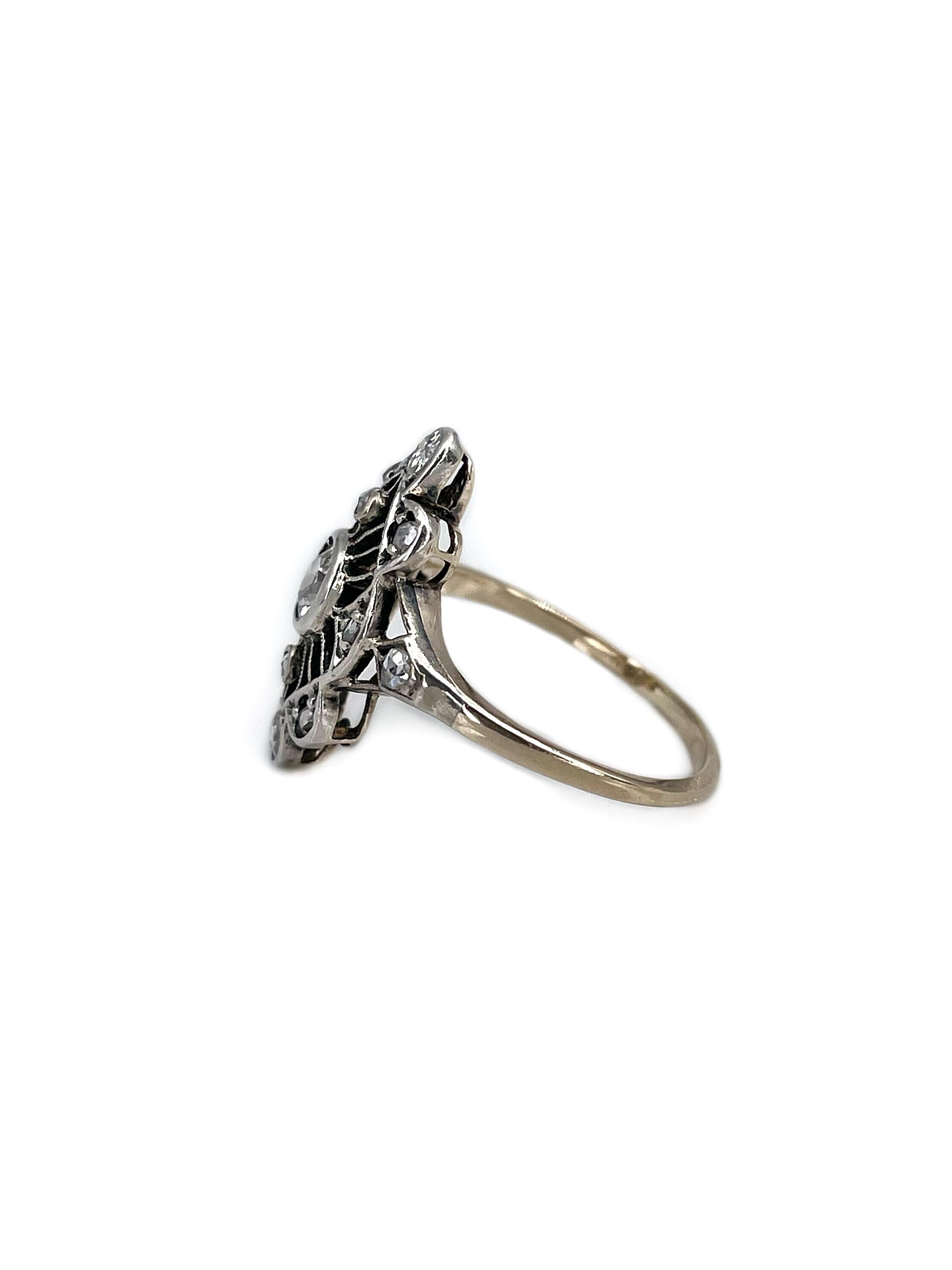 This is an elegant Art Deco navette ring crafted in 14K gold (56% pure gold in alloy) and adorned with silver. The piece features 3 Old European cut and 10 rose cut diamonds. Diamonds total weight 0.405ct, colour RW-W, clarity VS-SI.

It is a