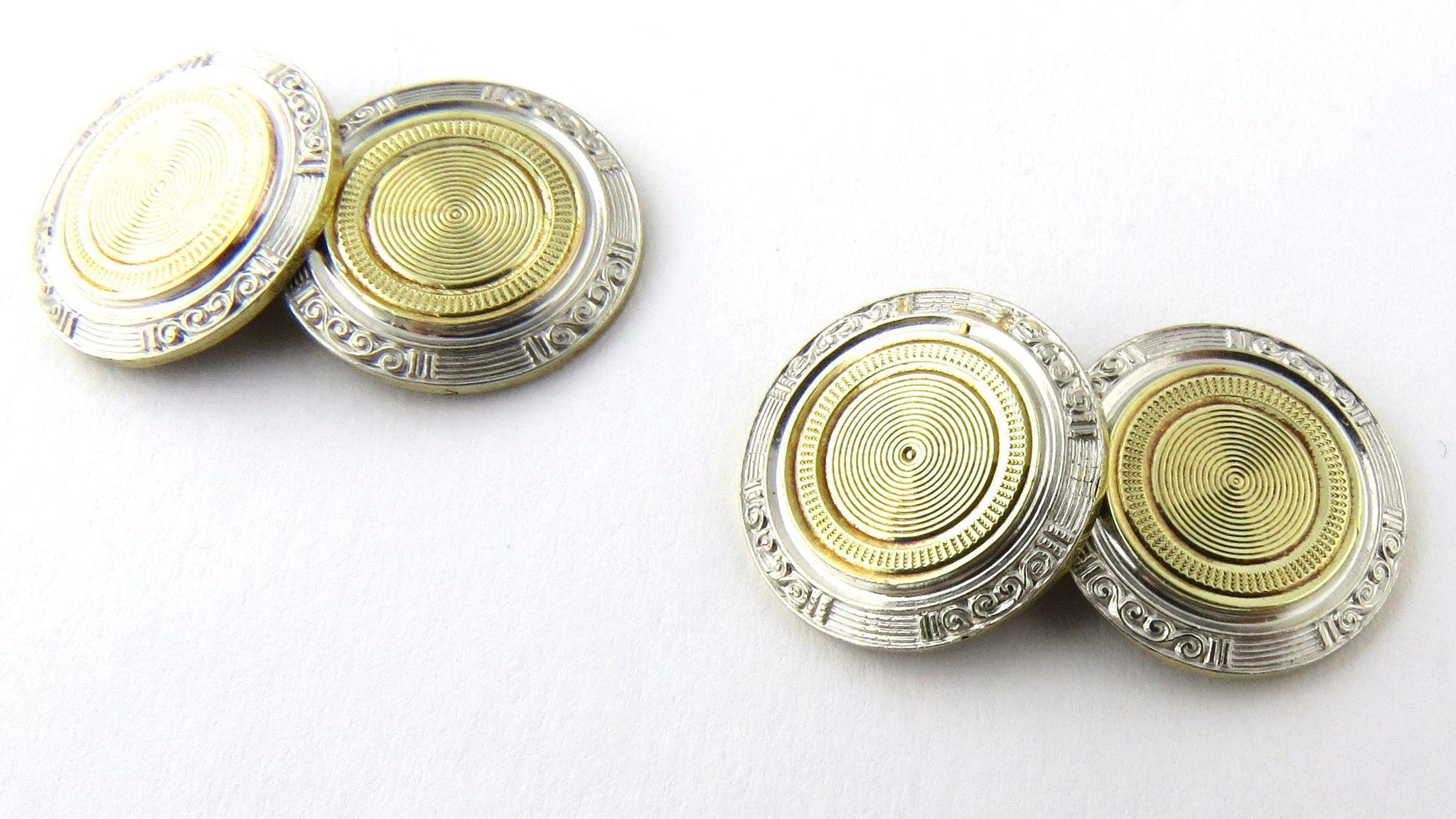 Art Deco 14K White and Gold Two Toned Engine Turned Cufflinks

 Hallmarked HW 14K 

14K engine turned center surrounded by a 14K white gold border

15 mm in diameter

 10.2 g 

6.55 dwt

 circa 1920's 

These will be packaged securely and shipped