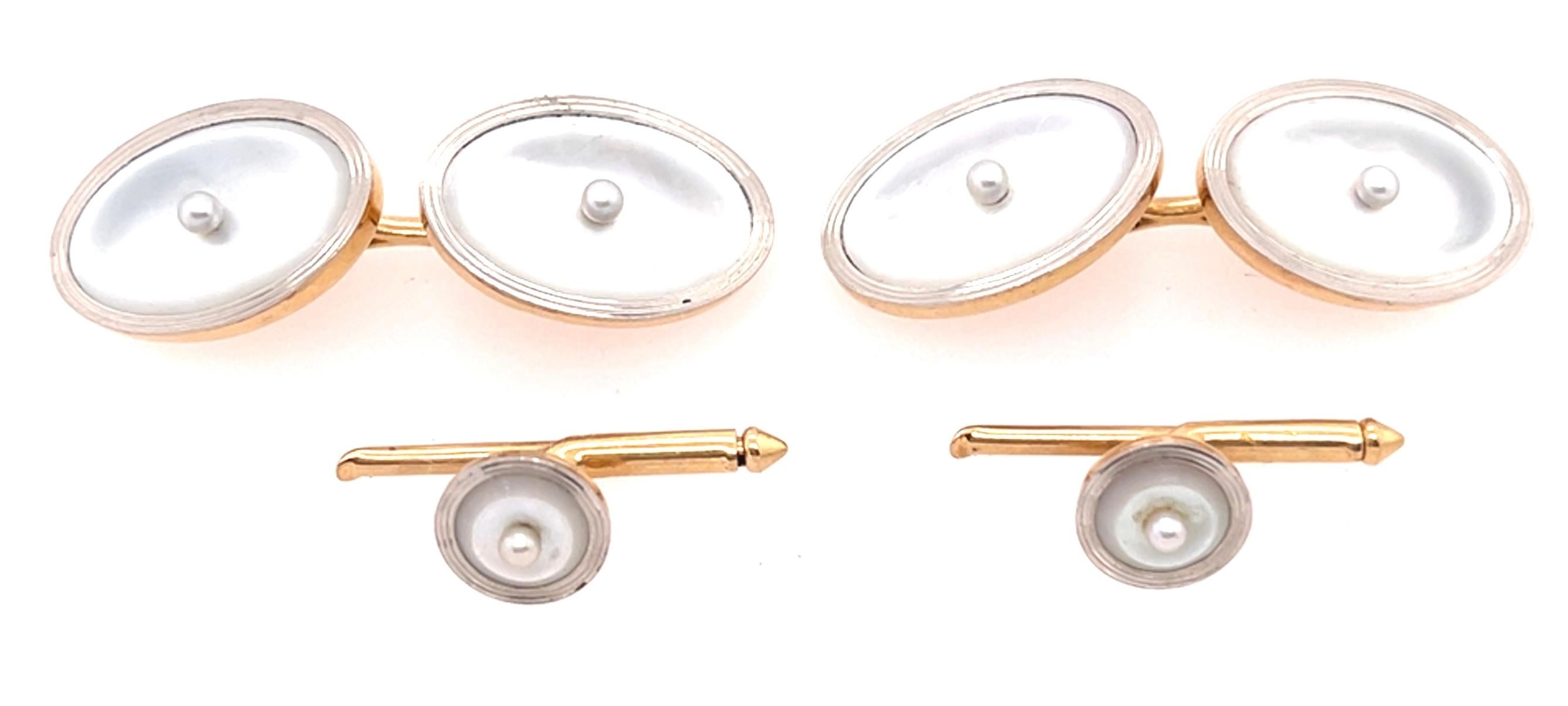 Art Deco Style 14 Karat Yellow Gold Mother of Pearl  with center seed pearl cufflinks and lapel pin set.  Set includes two cufflinks and two lapel pins.
10.8 grams total weight.
17.55 width
12.13 depth

