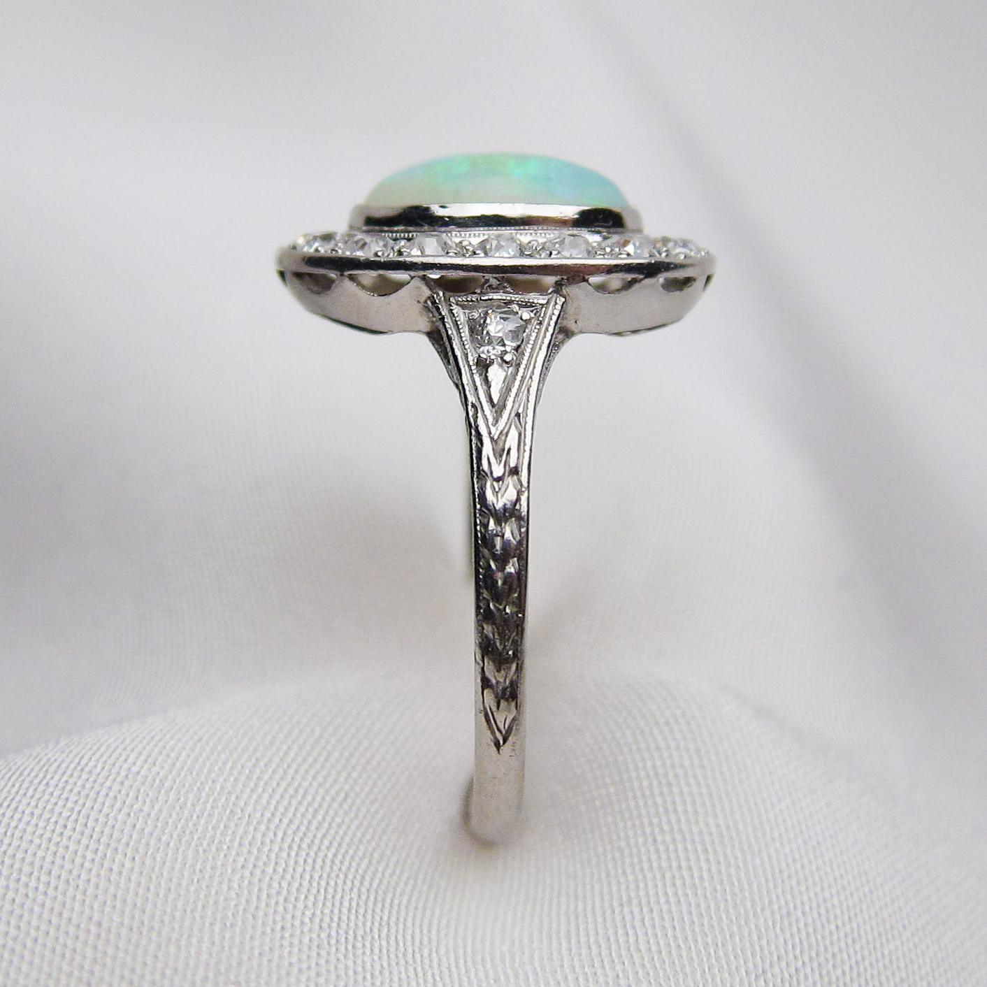 Art Deco 1.40 Carat Cabochon-Cut Opal and Diamond Halo Platinum Ring In Excellent Condition For Sale In Seattle, WA