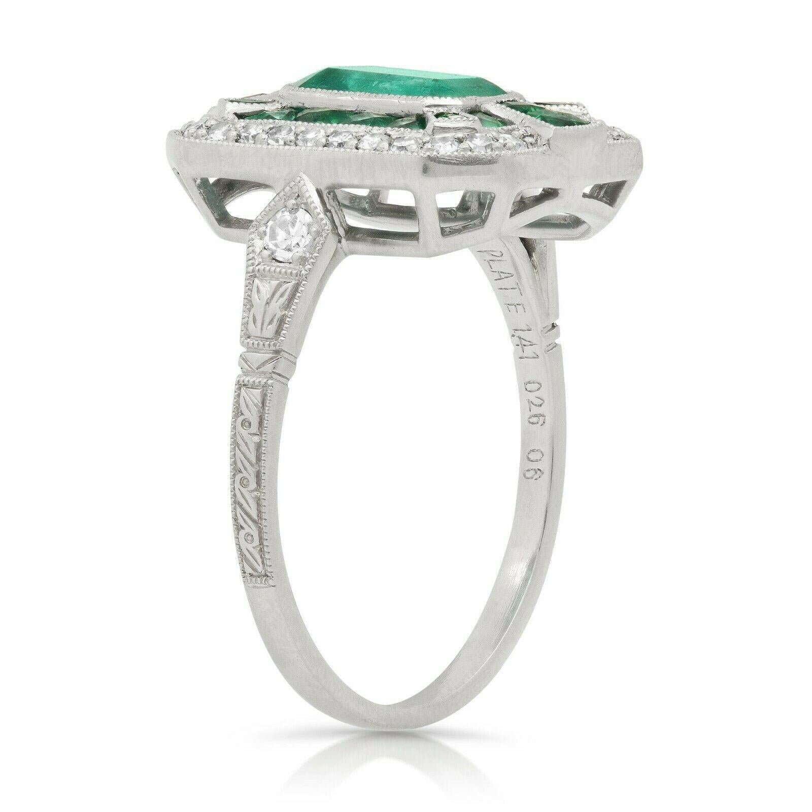 Emerald (2.01 total carat weight) and diamond (0.26 total carat weight) antique inspired cocktail ring in 900 platinum. The ring is designed and handmade locally in Los Angeles by Sage Designs L.A. using earth-mined and conflict free diamonds and