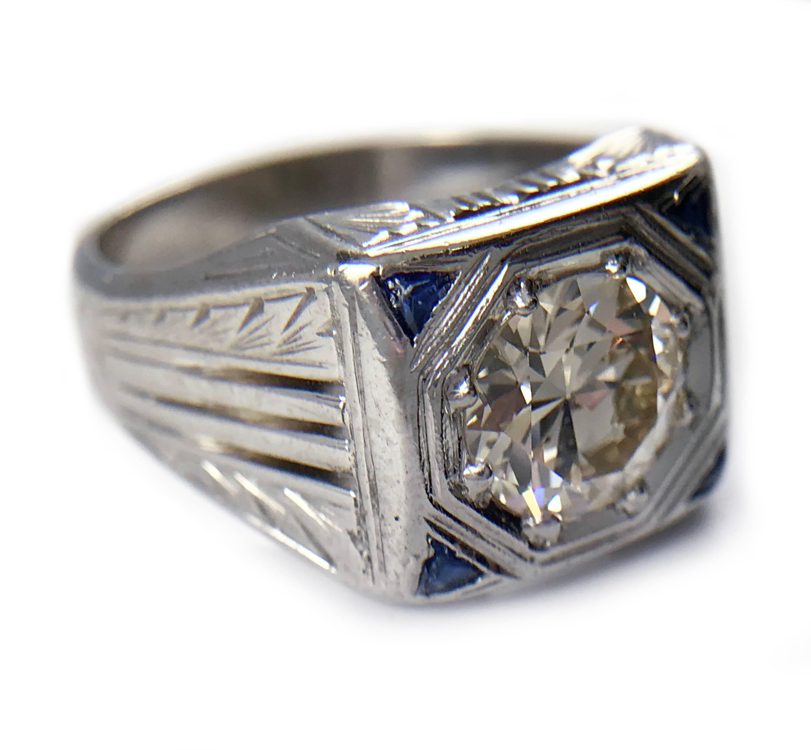 Art Deco Diamond and Sapphire 18k White Gold Ring. Diamond was removed, cleaned, weighed and measured by a certified gemologist. Center European-cut diamond is 1.41 carat, VS1-VS2 (G.I.A.) in clarity, M-L in color (G.I.A.) eight bead setting. Four