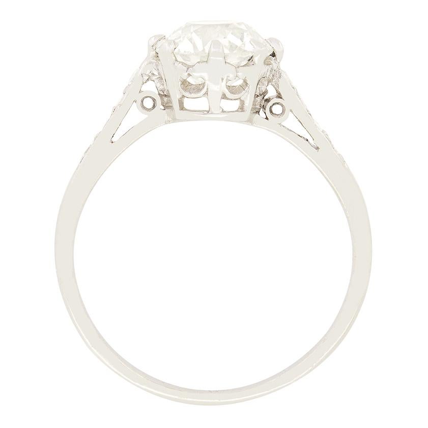 This Art Deco take on the timeless solitaire engagement ring is truly beautiful, featuring a glittering old cut diamond at it’s centre. Weighing 1.42 carat the diamond has a colour of J and a clarity of VS2. The diamond has been delicately claw set