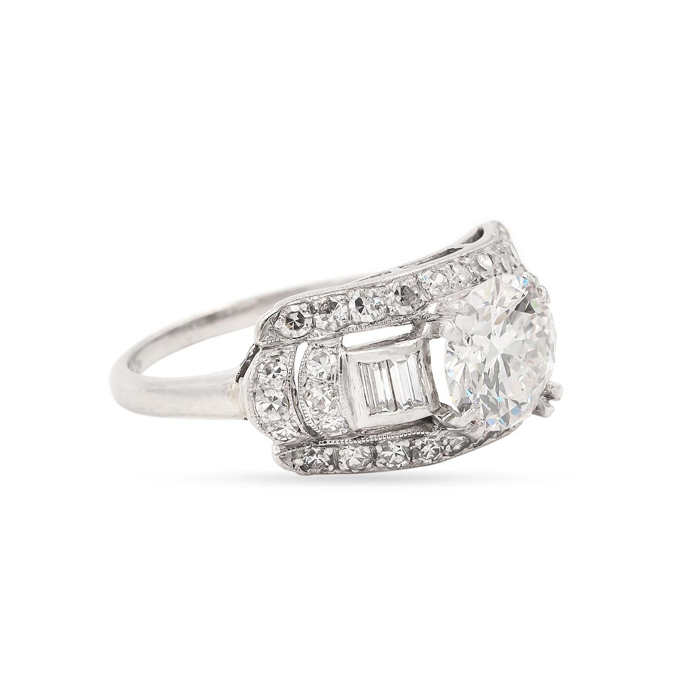 Late Art Deco era 1.44 Carat Transitional (Early Round Brilliant) Cut Diamond Engagement Ring composed of platinum. With a 1.44 Carat Transitional Cut diamond center, GIA certified H color & VVS2 clarity. With an additional 38 diamonds, a mix of