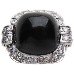 Art Deco 14.9 Carat Sugarloaf Onyx Cabochon and Diamond Platinum Ring