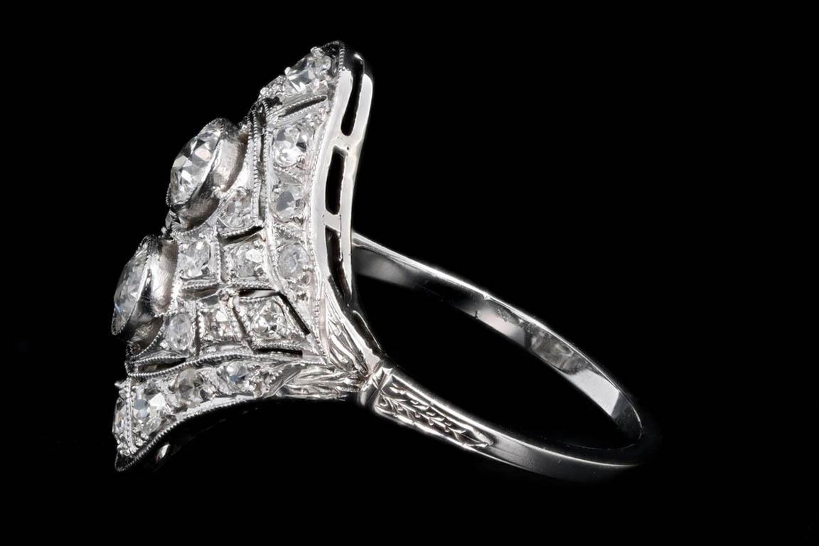 Art deco 14k gold & platinum .68 carat total weight old european cut diamond filigree ring

Era: Art Deco
Composition: 14K White Gold & Platinum Top
Primary Stone: Old European Cut & Antique Single Cut Diamonds
Total Carat Weight: Approximately .68