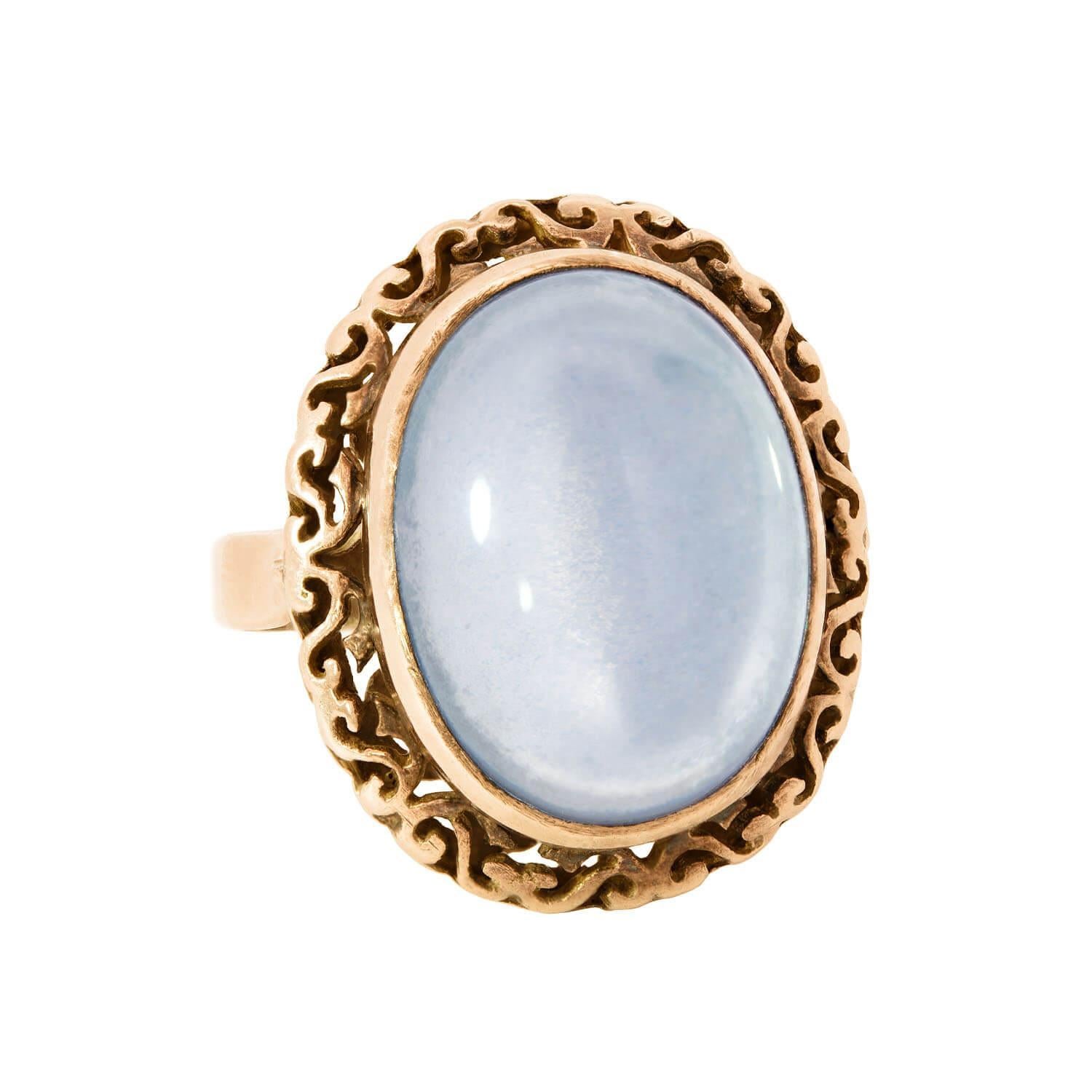 A beautiful moonstone ring from the Art Deco (ca1930) era! This lovely piece features a gorgeous moonstone cabochon set within a 14k rose gold mounting. The alluring moonstone has exceptional color and clarity, displaying iridescent flashes of pale,