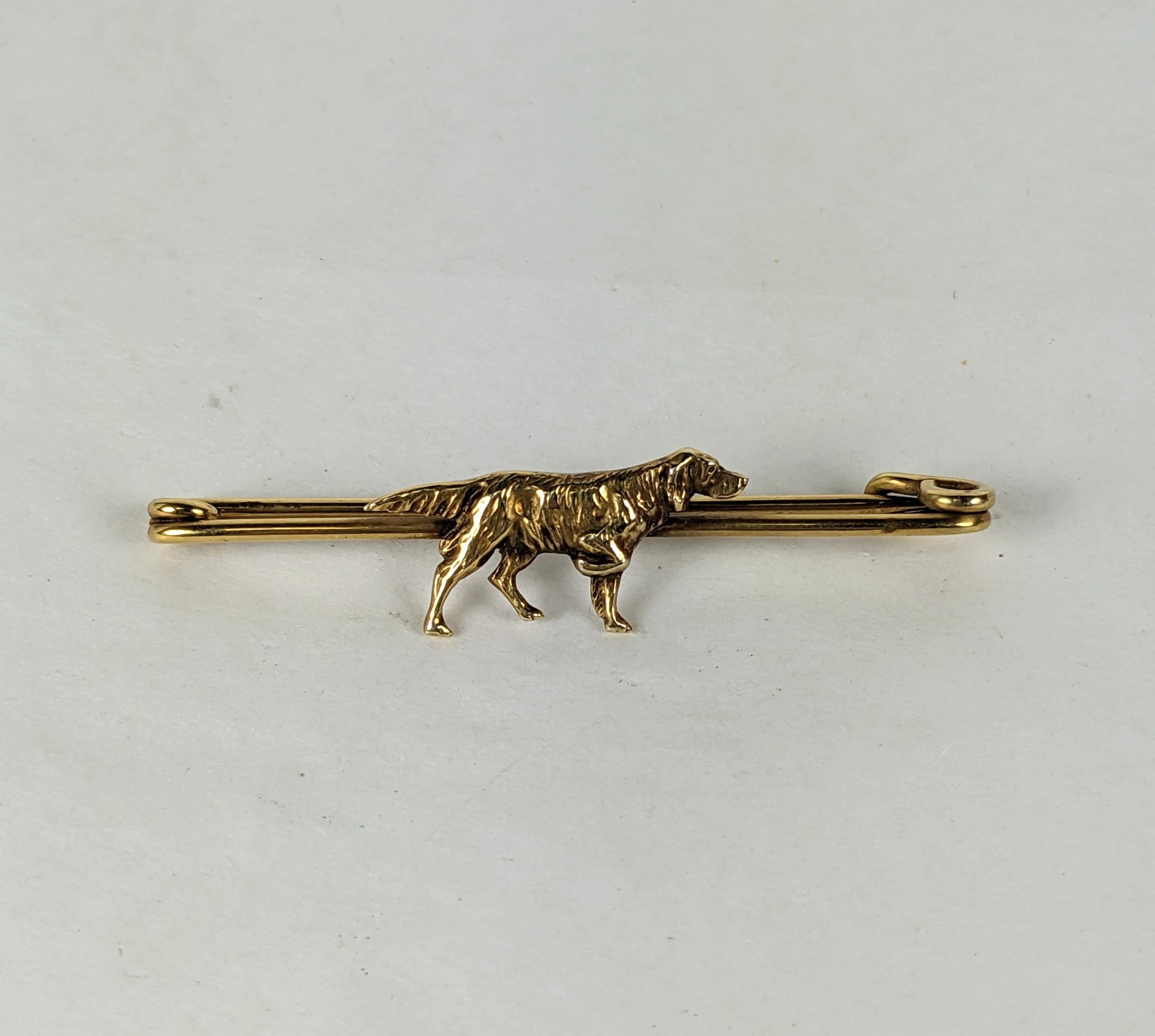 Attractive Art Deco 14k Pointer Dog Brooch designed to fasten a scarf or tie. Detailed pointer dog in stance on large safety pin style brooch. 14k tested. 1930's USA. 
2.5